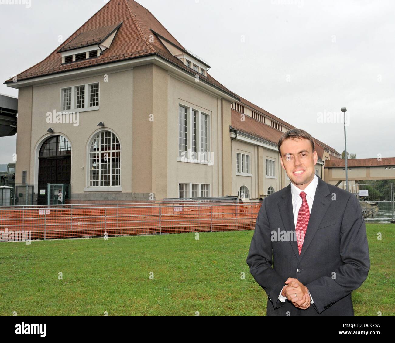 Minister of Economy of Baden-Wuerttemberg, Nils Schmid, stands in front of the building of the hydroelectric power station Augst-Whylen in Grenzach, Germany, 30 August 2012. The power station turned 100 this year. Photo: PATRICK SEEGER Stock Photo