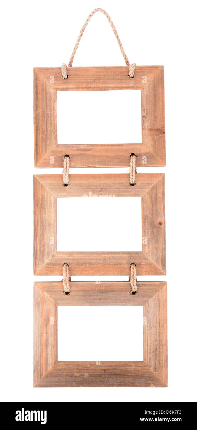 three natural wood picture frames hung together with rope isolated on a
