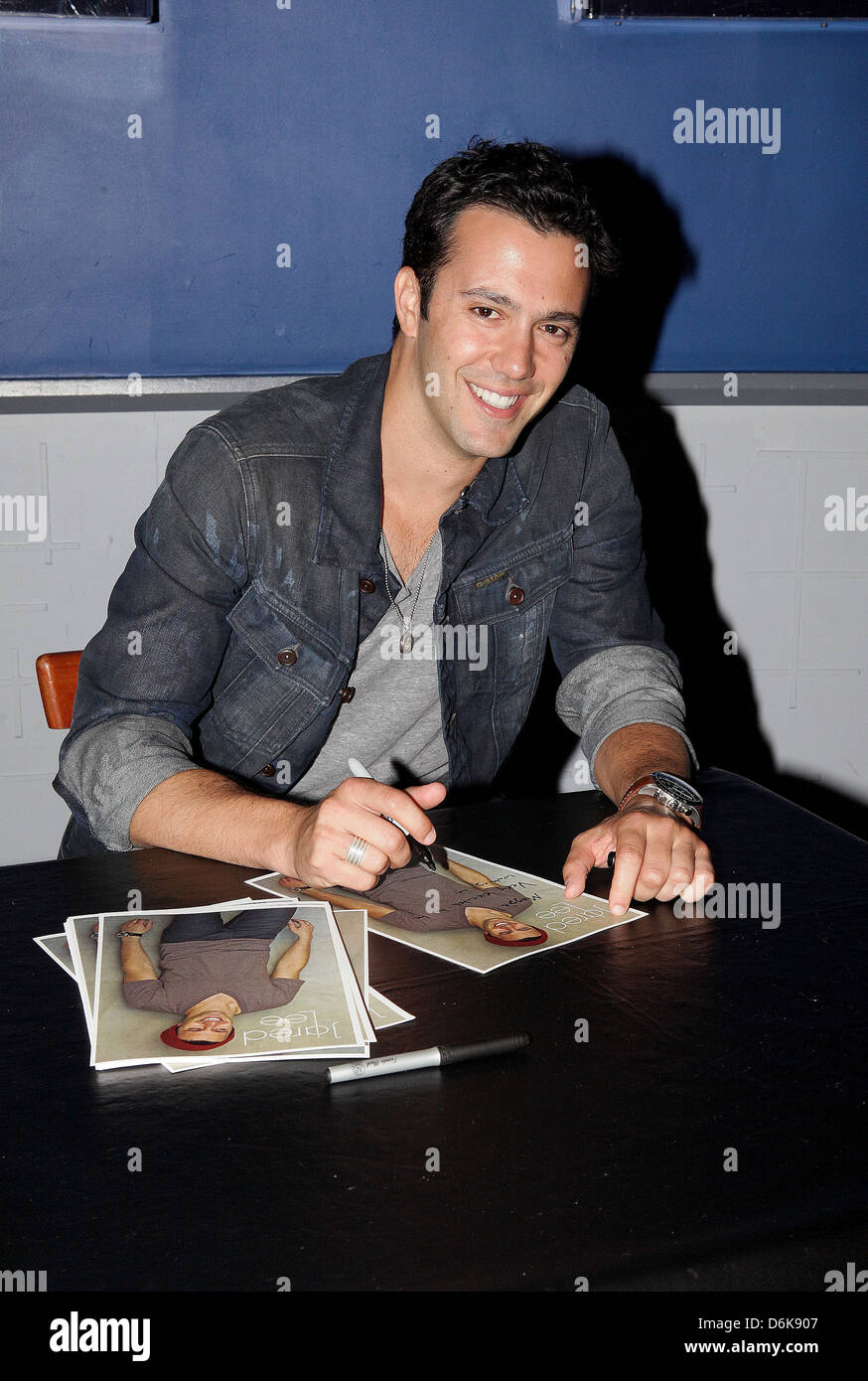 Jared Lee singer-songwriter promotes his debut EP 'Falling Through Holes'  with a meet and greet at Planet Hollywood Times Stock Photo - Alamy