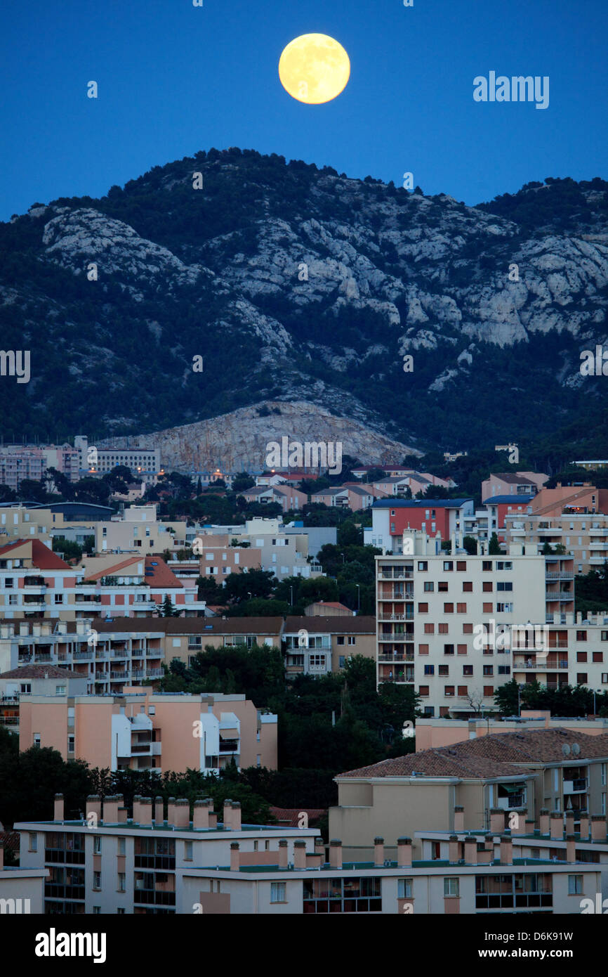 The full moon above the city of Marseille Stock Photo Alamy