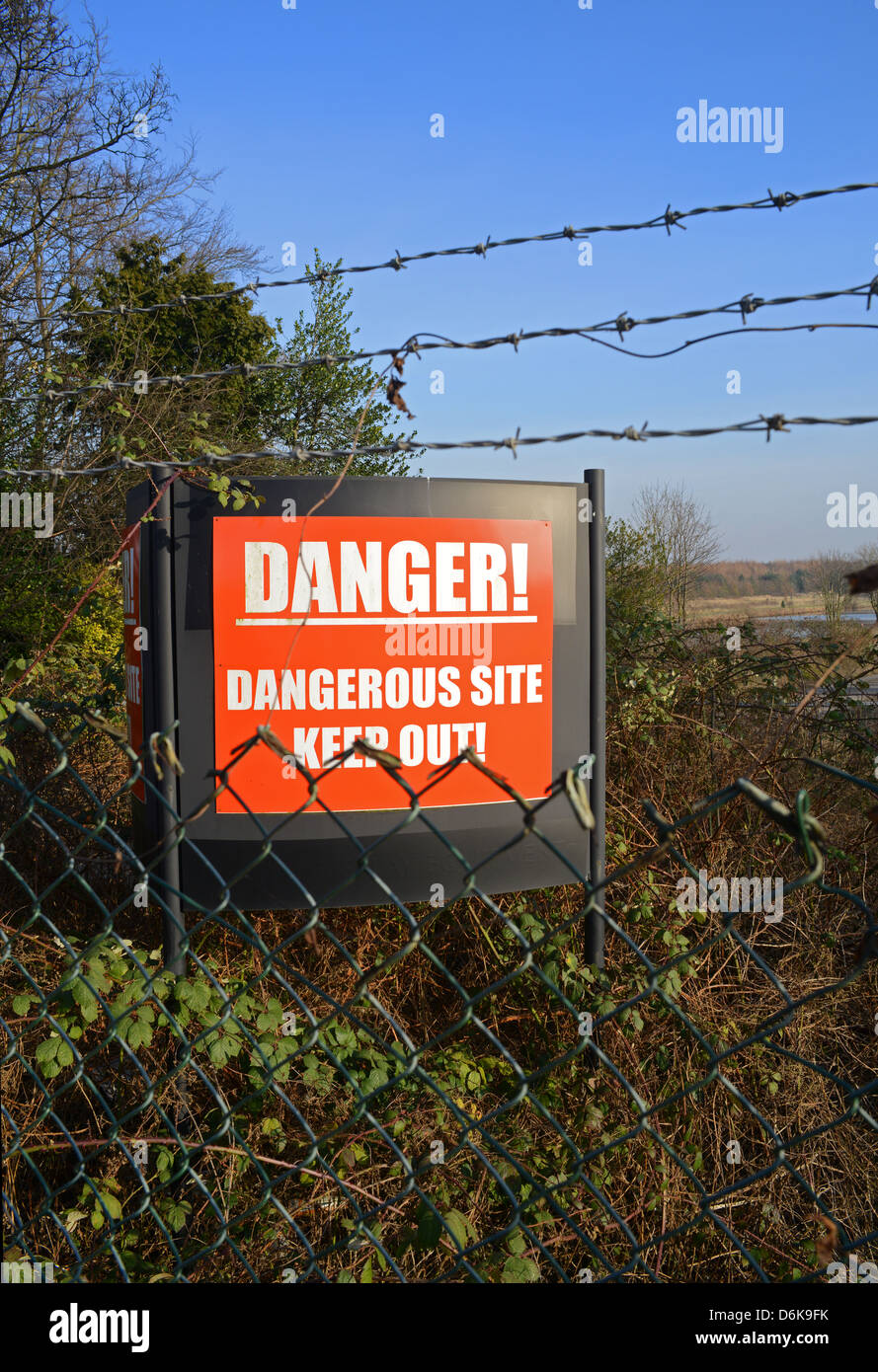 keep out warning sign of dangerous industrial site leeds yorkshire united kingdom Stock Photo
