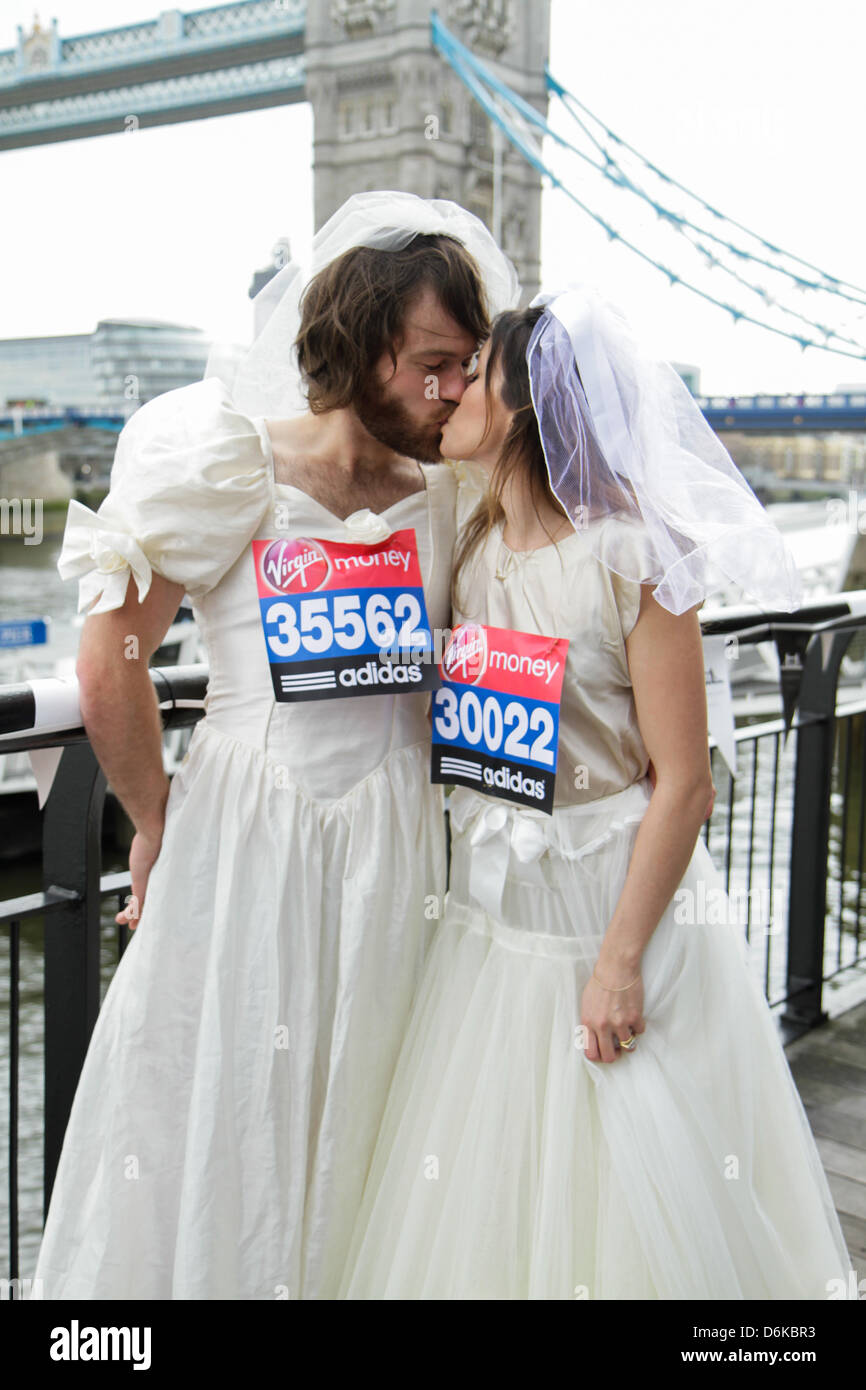 London, UK. 19th April, 2013. Toby and Sophie McCorry will attempt the  Guinness World Record for 'fastest man and woman in wedding dress' during  Sunday's Virgin London Marathon raising money for British