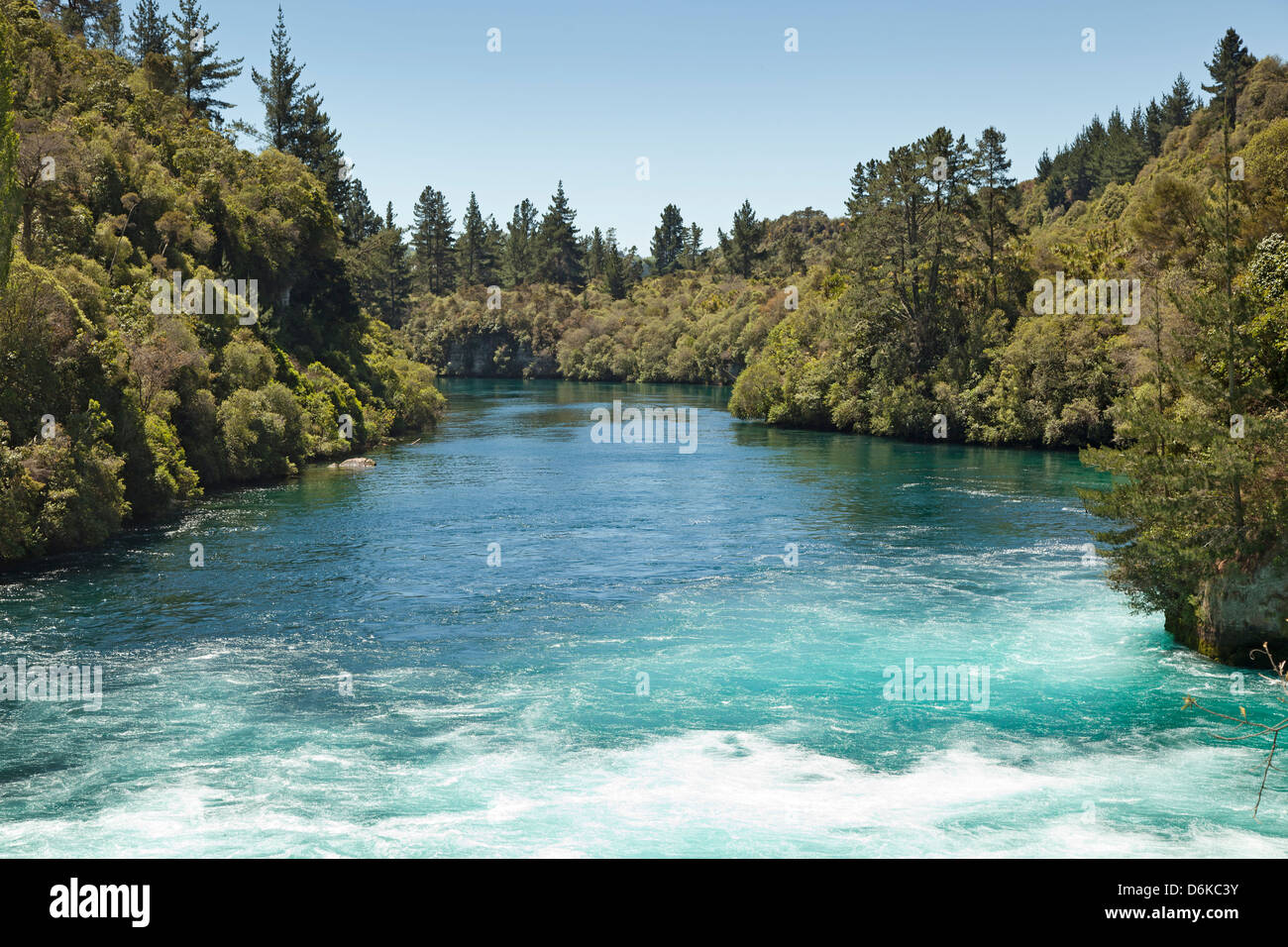 The Waikato River rushes toward Huka Falls near Taupo New Zealand Stock Photo