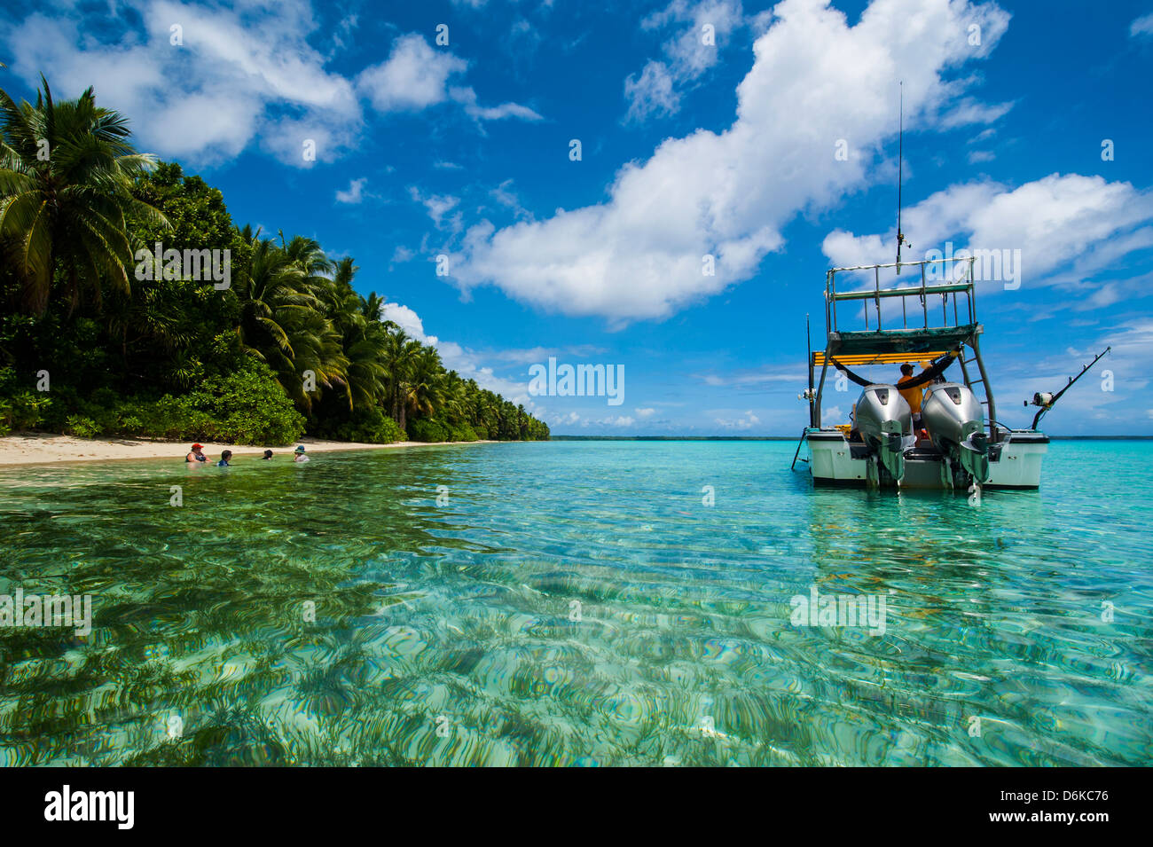 Little motor boat in the turquoise waters of the Ant Atoll, Pohnpei, Micronesia, Pacific Stock Photo