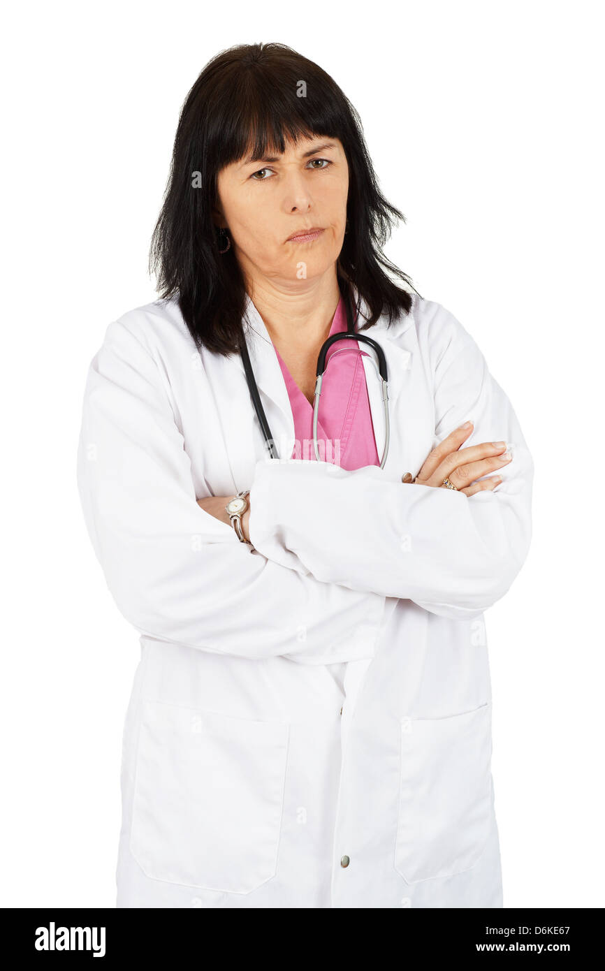 Middle age woman doctor with arms crossed, unhappy, on white Stock Photo