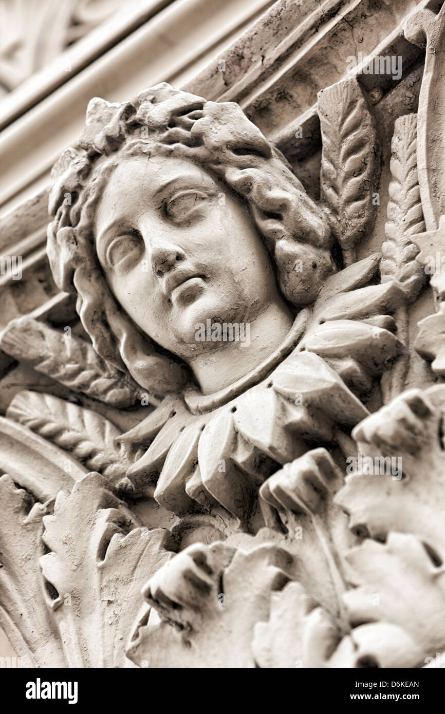 Head of greek goddess Demeter, detail of neoclassical facade Stock Photo