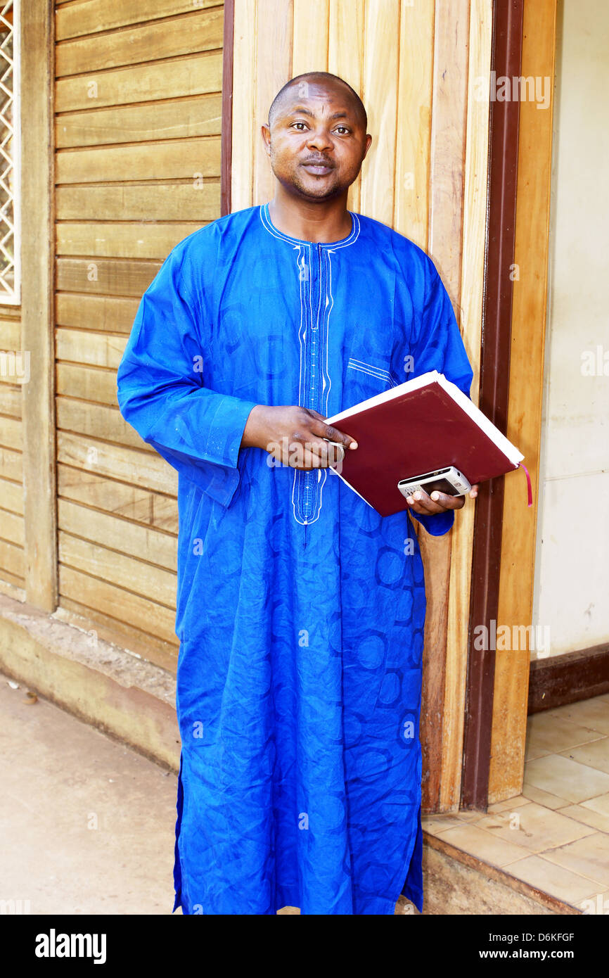 African business man in blue traditional or ethnic clothes. Stock Photo