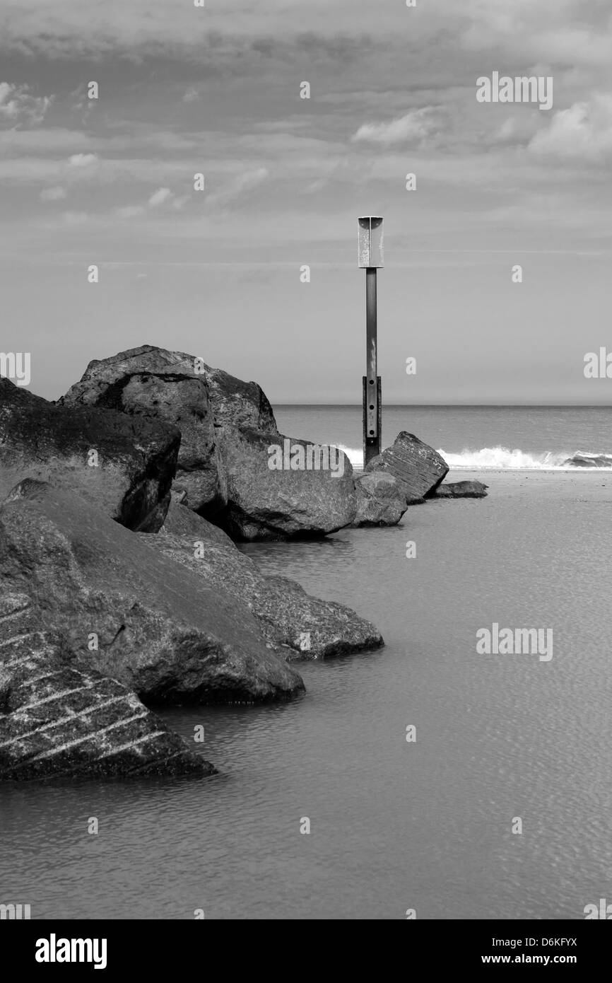 Rocks into the Sea Stock Photo