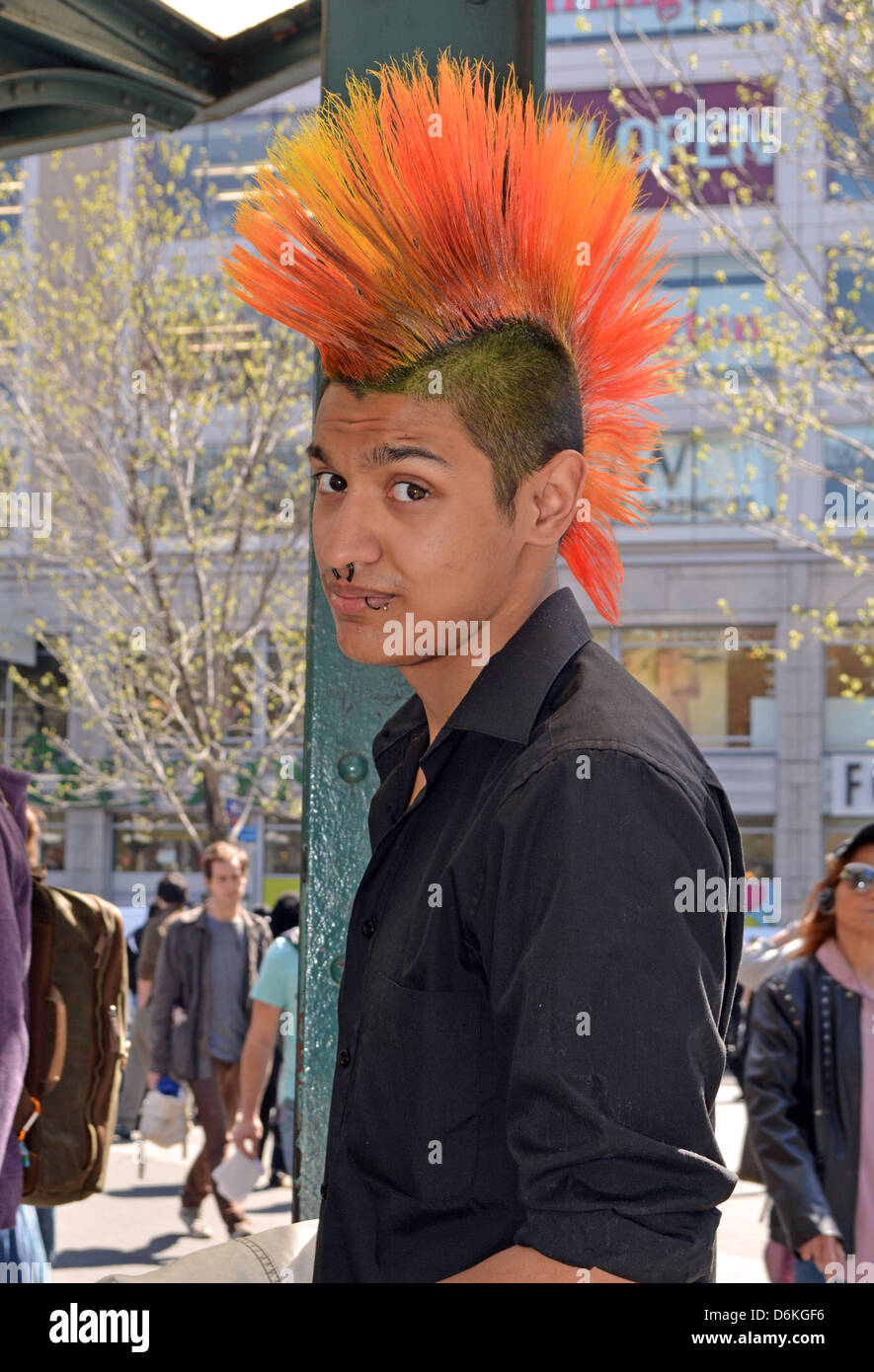 Young man with a colorful Mohawk haircut at Union Square Park in New York City Stock Photo