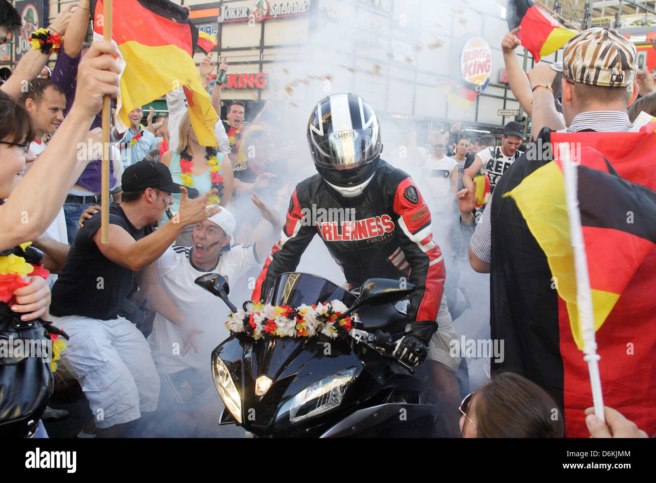 Berlin, Germany, German fans cheer on the Kurfuerstendamm after the