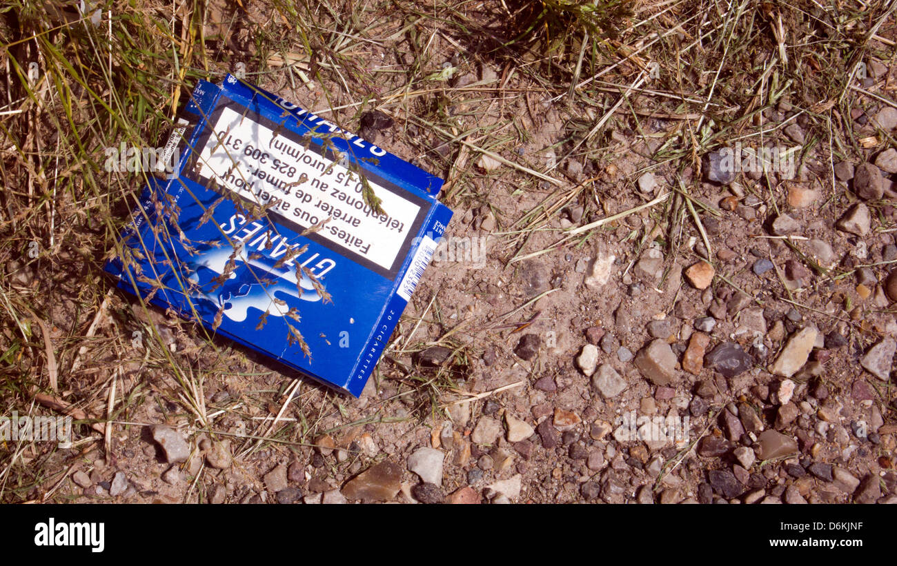 Empty cigarette packet, roadside, Gitanes, France Stock Photo