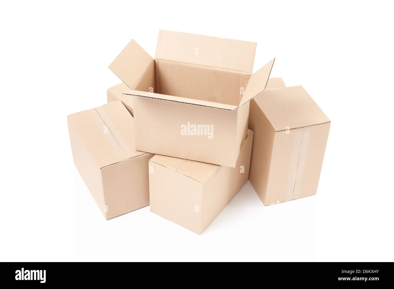 Open cardboard box on top of others isolated on white, clipping path included Stock Photo