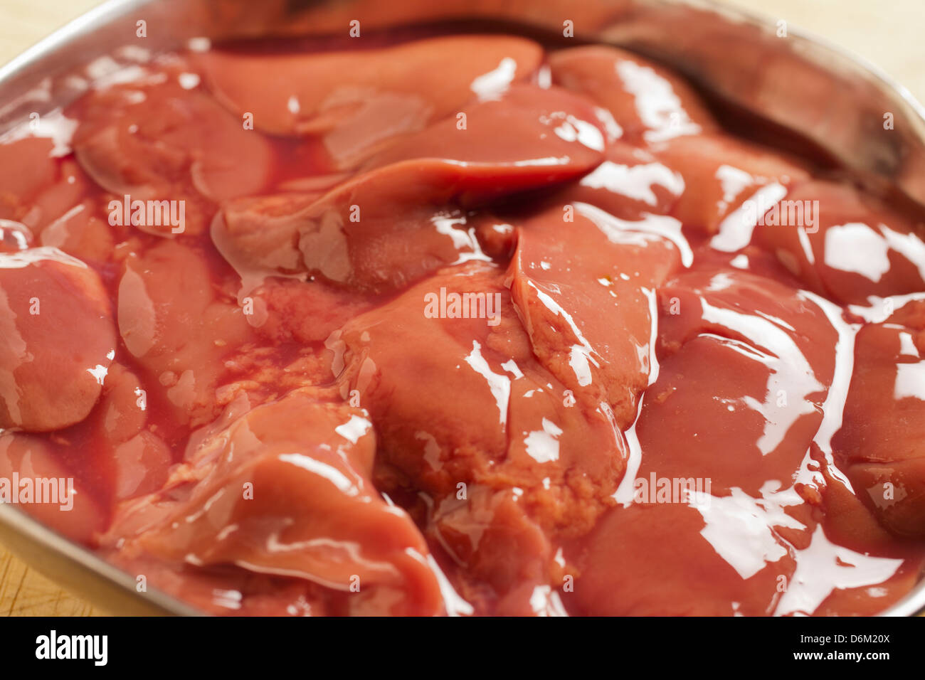 bowl of raw chicken livers Stock Photo
