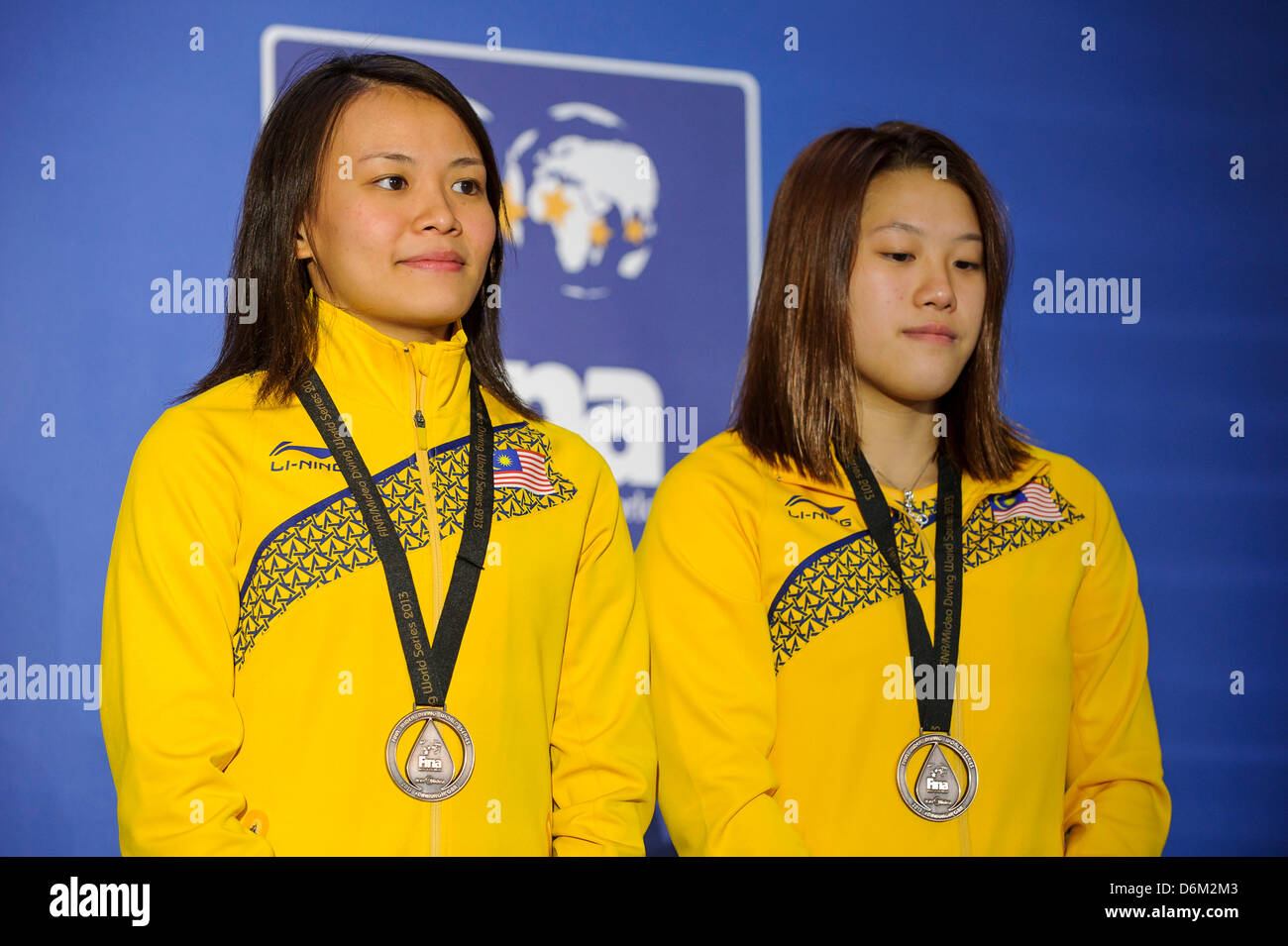 Edinburgh, Scotland. 19th April, 2013. Bronze medallists Yee Ng Yan &amp; Hoong Cheong Jun of Malaysia (MAS) on the podium for the Womens 3m Synchronised Springboard Final on Day 1 of the FINA/Midea Diving World Series 2013 at the Royal Commonwealth Pool in Edinburgh. Stock Photo