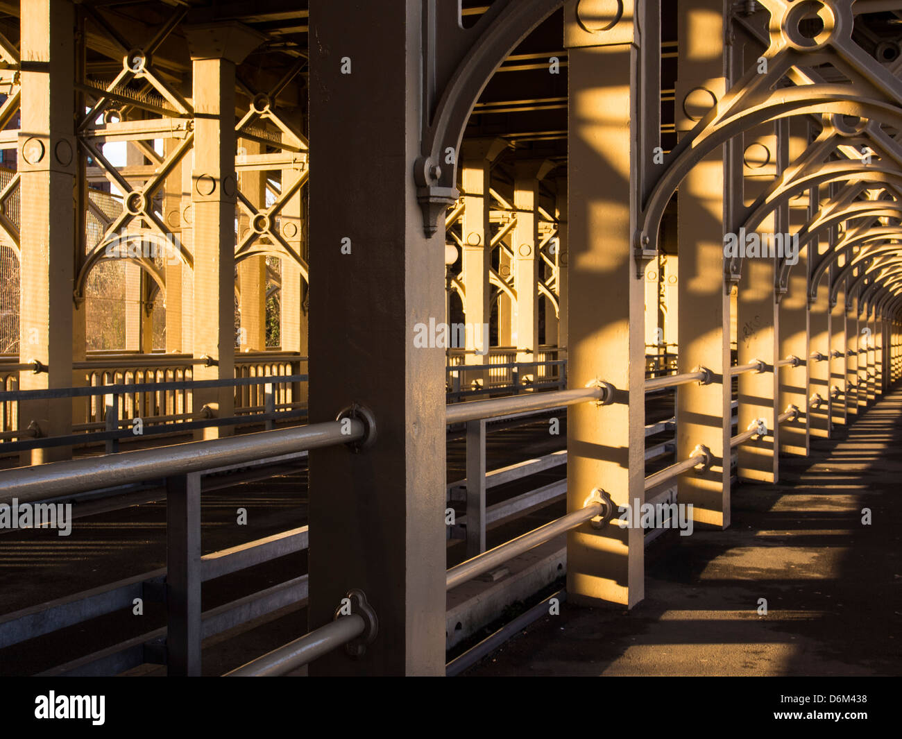 Wrought iron tied arch or bow string girder bridge hires stock