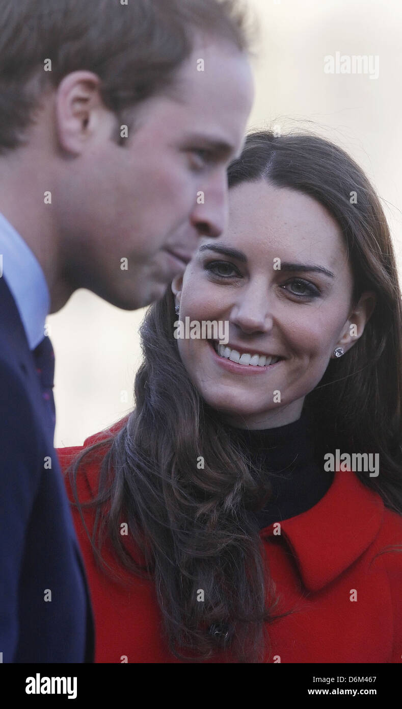 Britain's Prince William and his bridetobe, Kate Middleton visit St