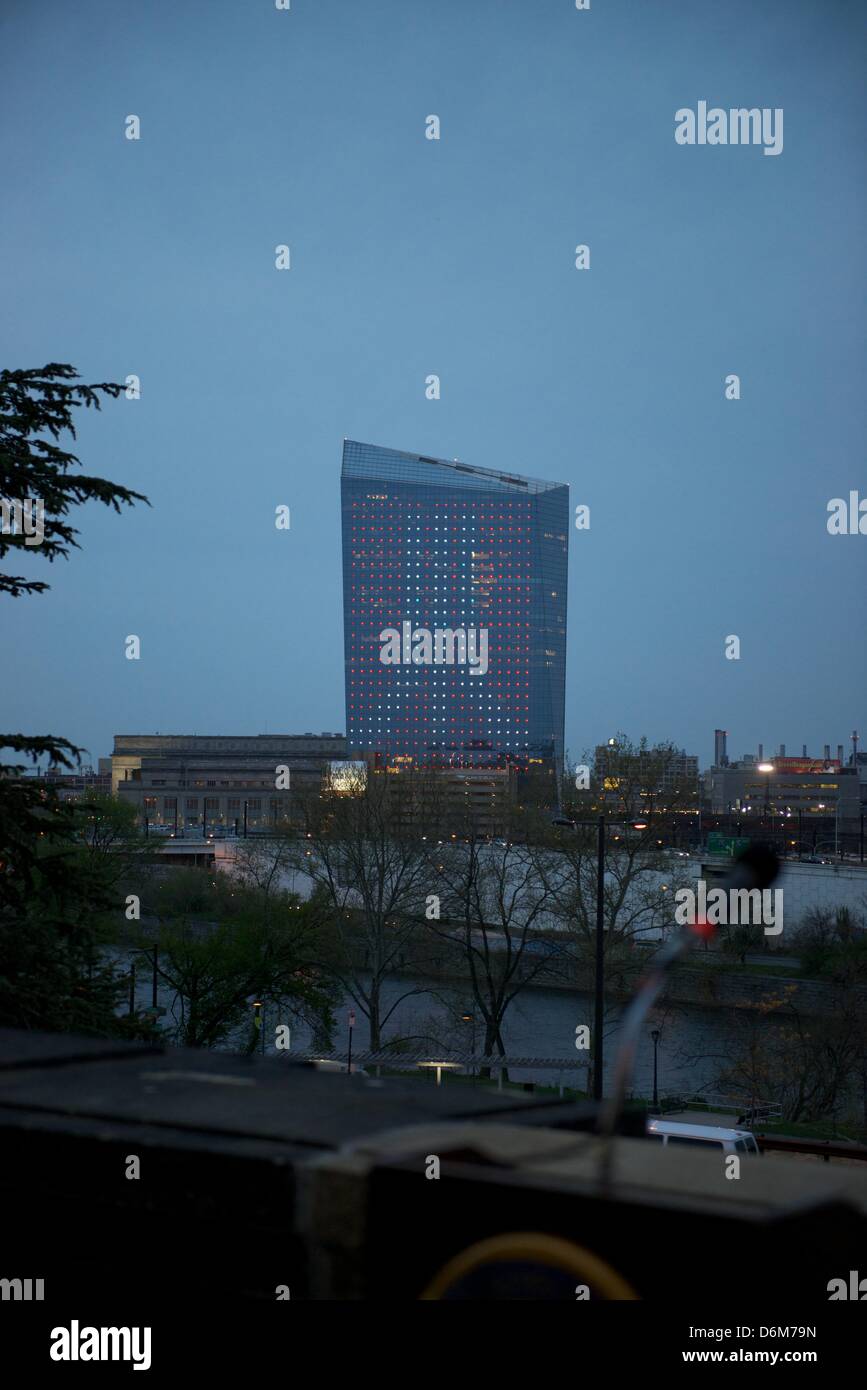 People gathered on the steps of the Philadelphia Museum of art to play the world's largest video game of Pong on the Cira Centre Building.  Created by Dr. Frank Lee, associate professor at Drexel University and the game's visionary, in Philadelphia, Pennsylvania on April 19, 2013. This event officially kicks off Philly Tech Week. Stock Photo