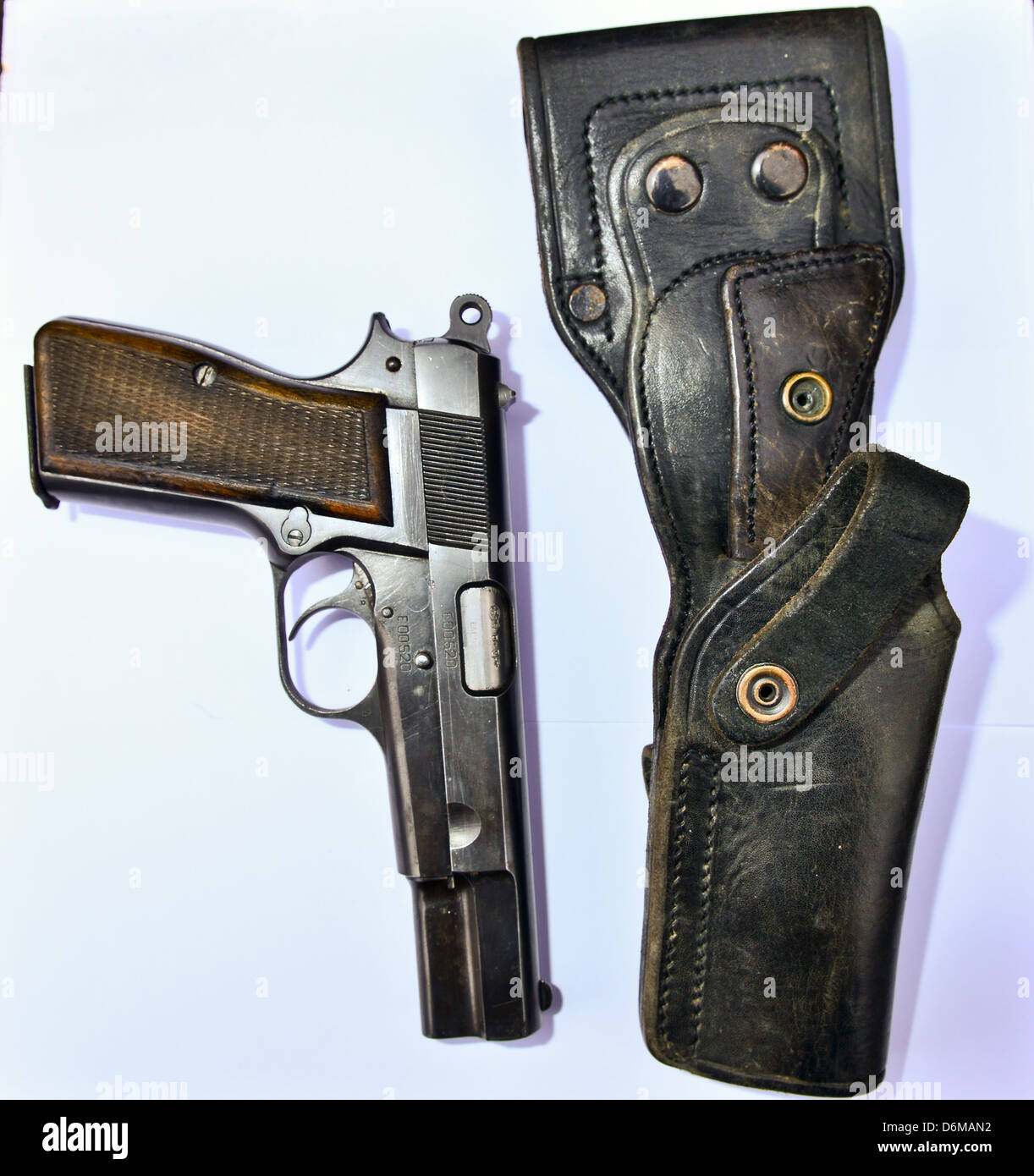 Original Browning high power  9mm pistol and it's original Len Dixon made leather holster Stock Photo