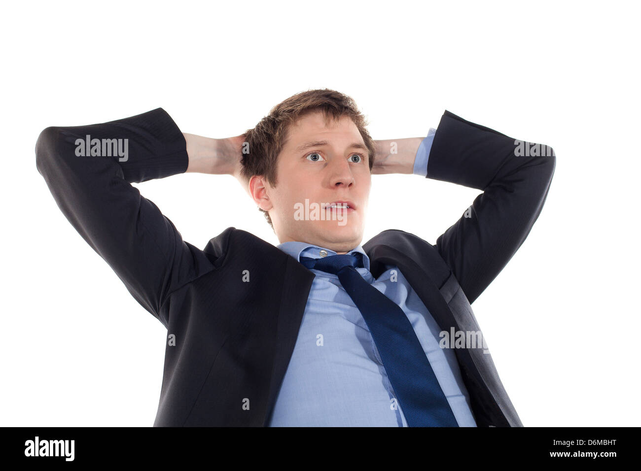 serious and tired young businessman on a whire background Stock Photo