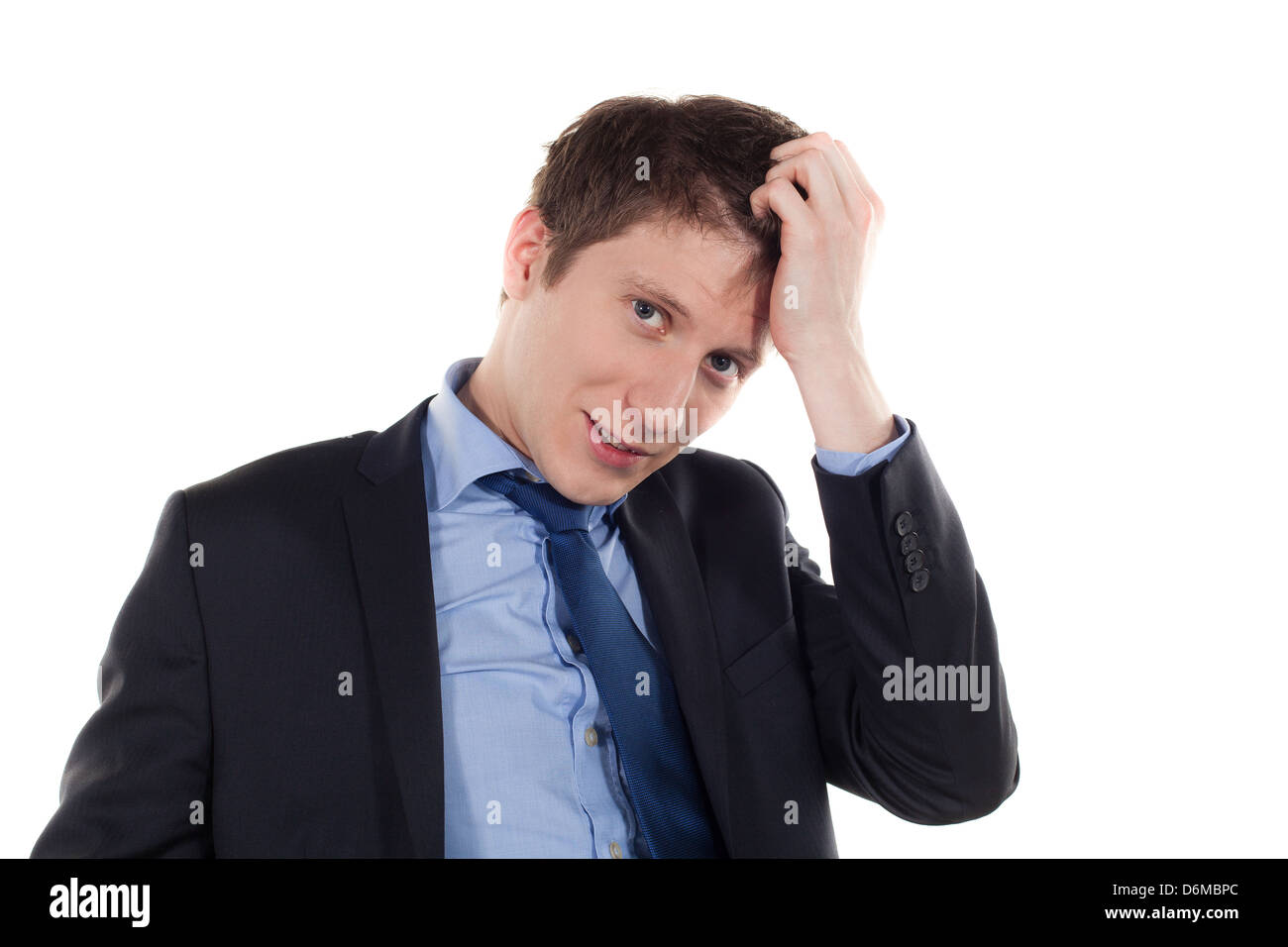 serious and tired young businessman on a white background Stock Photo