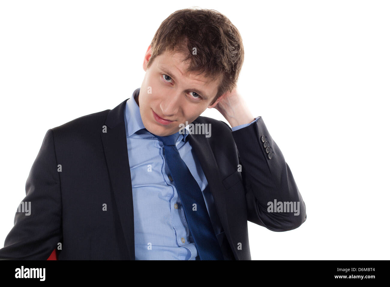 serious and tired young businessman on a whire background Stock Photo
