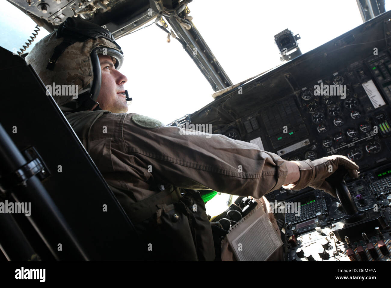 A US Marine pilot flies a CH-53E Super Stallion aircraft during operations April 10, 2013 in Helmand province, Afghanistan. Stock Photo