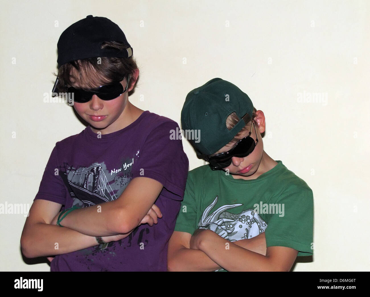 Berlin, Germany, with boys in baseball caps and sunglasses portrait Stock Photo