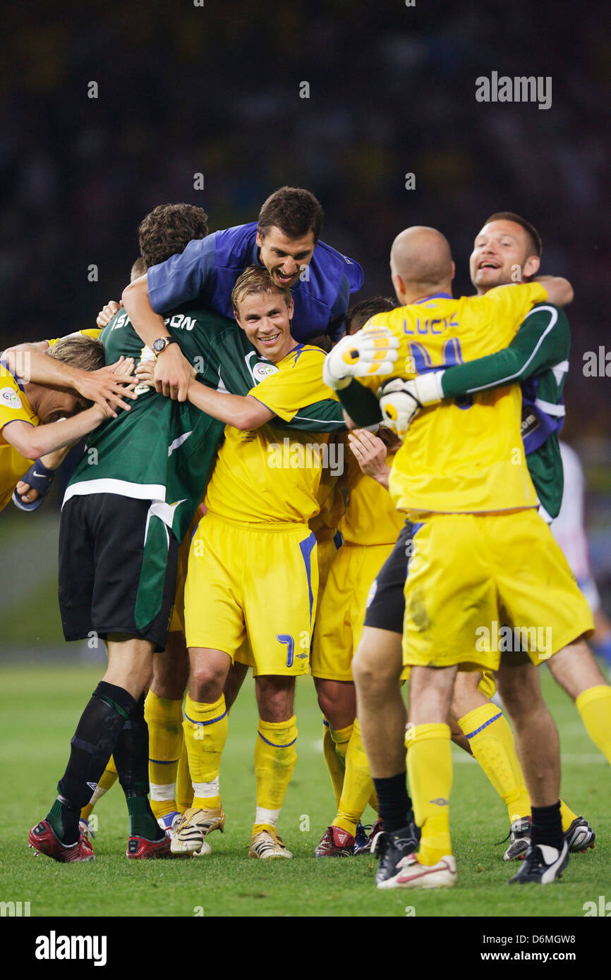 Sweden players celebrate after defeating Paraguay in a FIFA World Cup