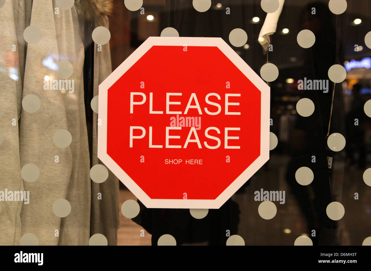 Hong Kong, China, Warning Sign Here Please Please shop at a store window Stock Photo