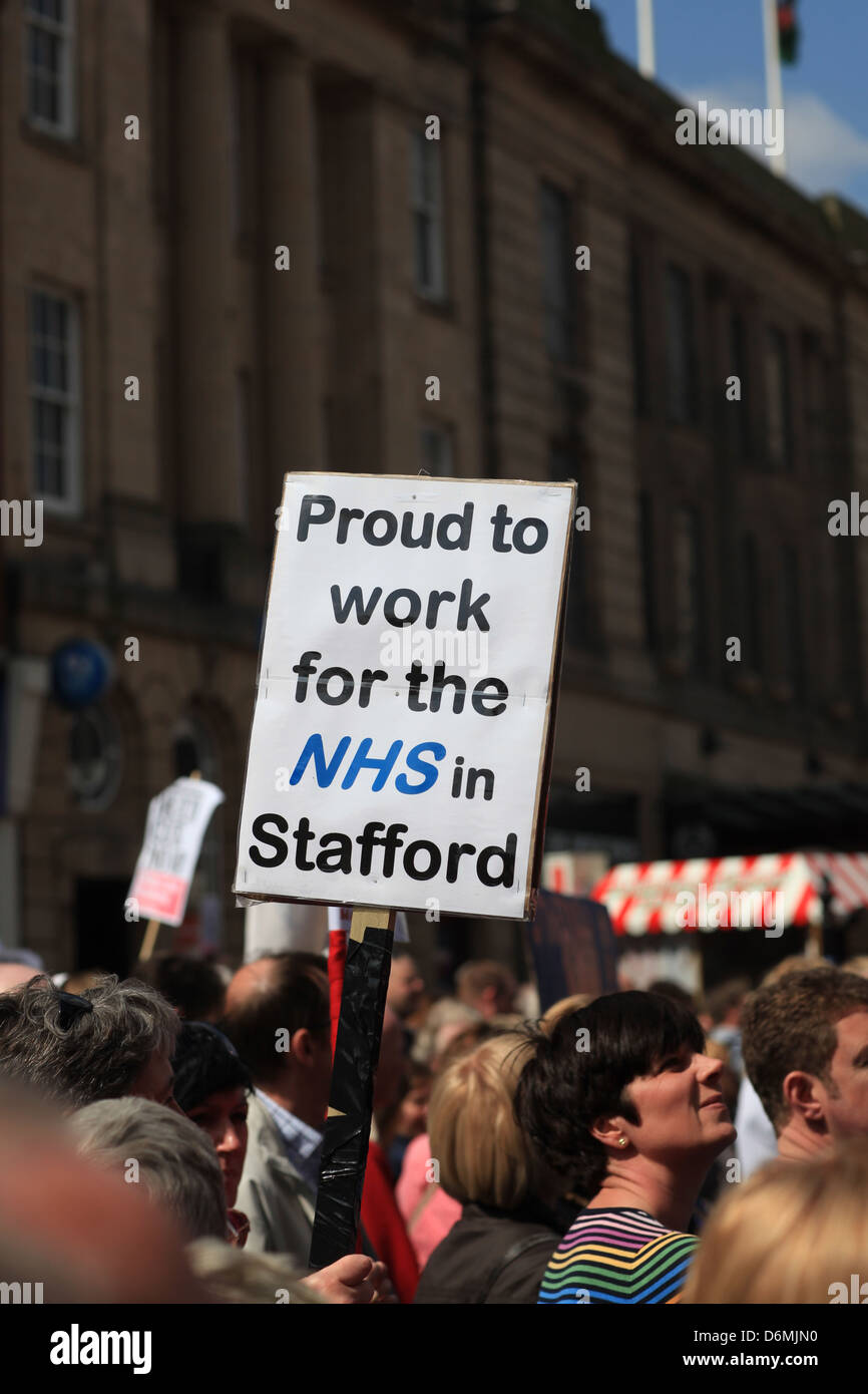 Protesters march through Stafford against cuts to NHS services at Stafford Hospital Stock Photo