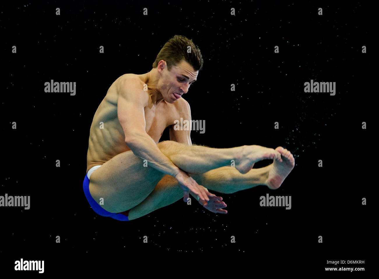 Edinburgh, UK. 20th April, 2013.  Troy Dumais of America (USA) in action during the Mens 3m Springboard Semifinals on Day 2 of the FINA/Midea Diving World Series 2013 at the Royal Commonwealth Pool in Edinburgh. Stock Photo