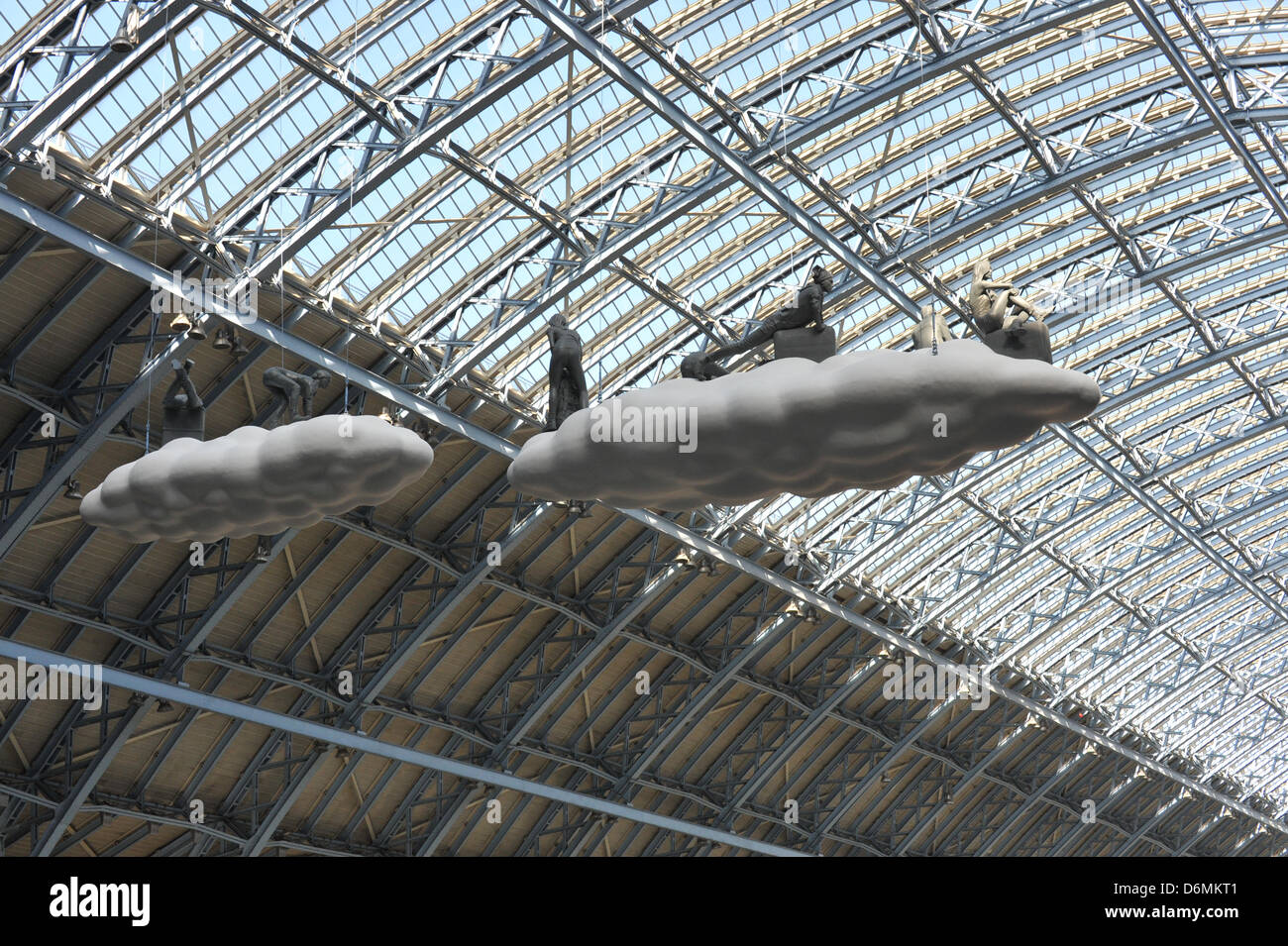 St Pancras Station, London, UK. 20th April 2013.  Cloud: Meteros. A giant 15 metre cloud installation unveiled at St Pancras International station in London. The work, created by husband and wife team Lucy and Jorge Orta, has been placed above the station's Grand Terrace. Cloud: Meteoros is the first artwork in a series of 'Terrace Wires' pieces commissioned by HS1 Ltd for the space - which was home to the Olympic rings last summer. Credit: Matthew Chattle/Alamy Live News Stock Photo