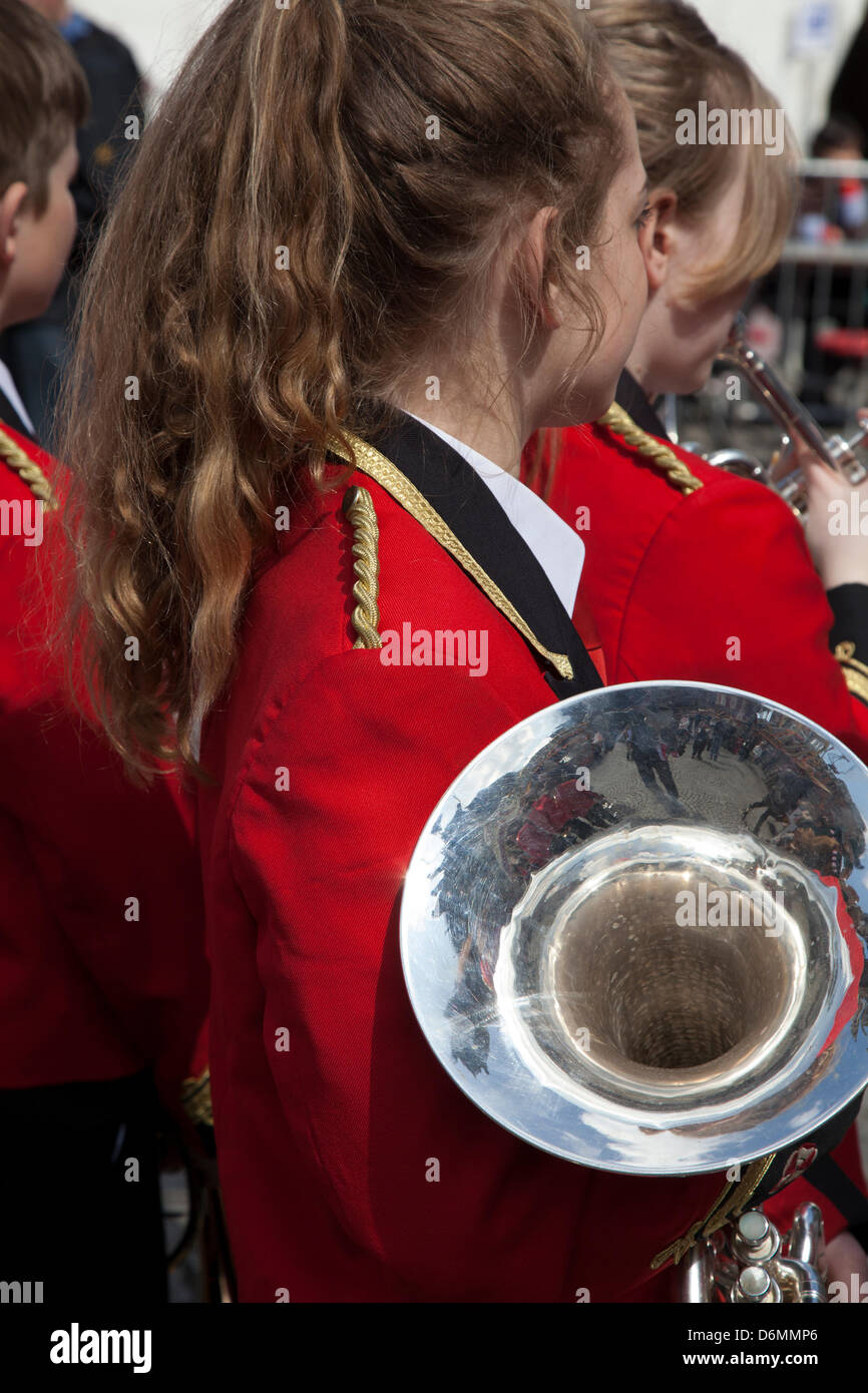 Manchester, UK. 20th April, 2013. Young musicians of the Dobcross Orchestra Youth Band play at the St George's day celebrations, a group event held in Albert Square and Piccadilly, an extension of the annual St George Parade to celebrate England's Patron Saint, with many musical performers various instruments and entertainers playing. Stock Photo