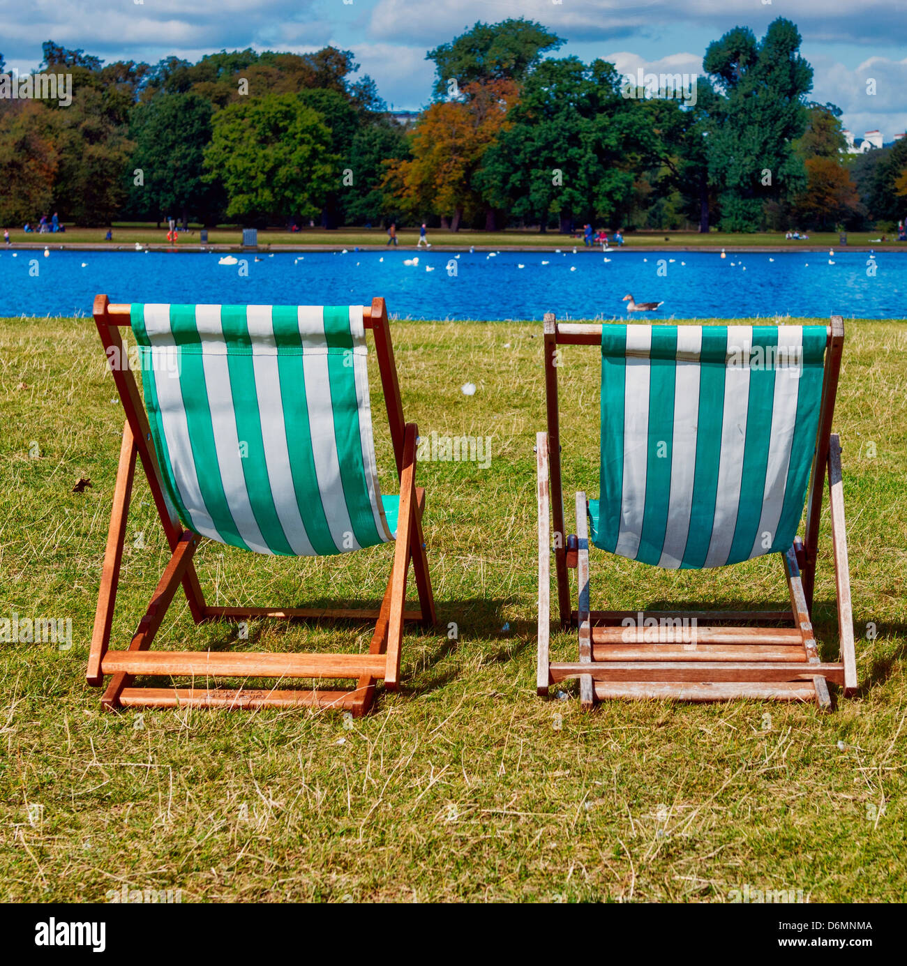 Relaxing on deckchair in a beautiful park. Stock Photo