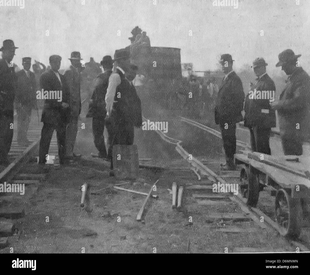 The work of dime novel heroes - Investigating a  train robbery, circa 1912 Stock Photo