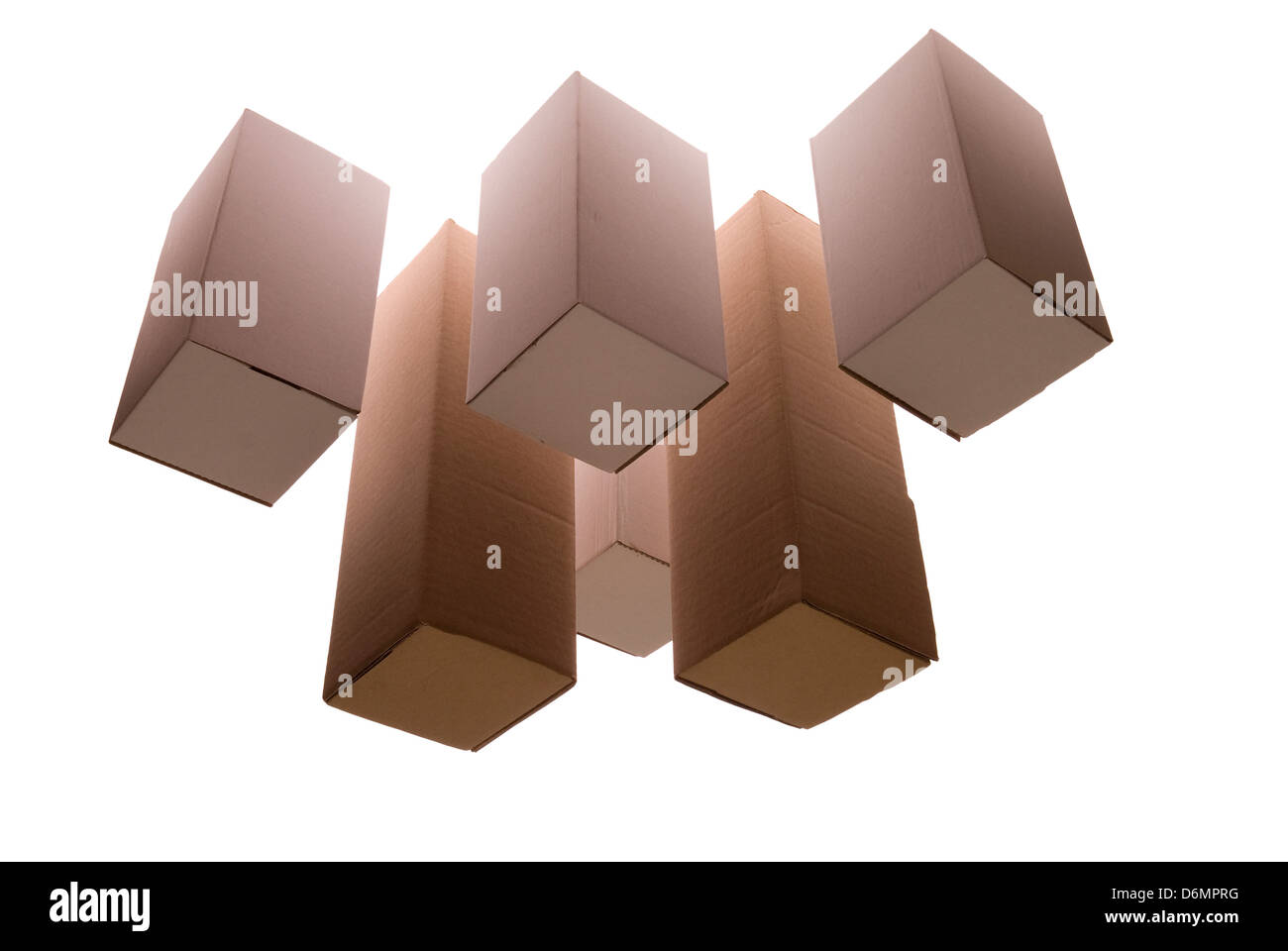large and small cardboard boxes lighted up with light Stock Photo