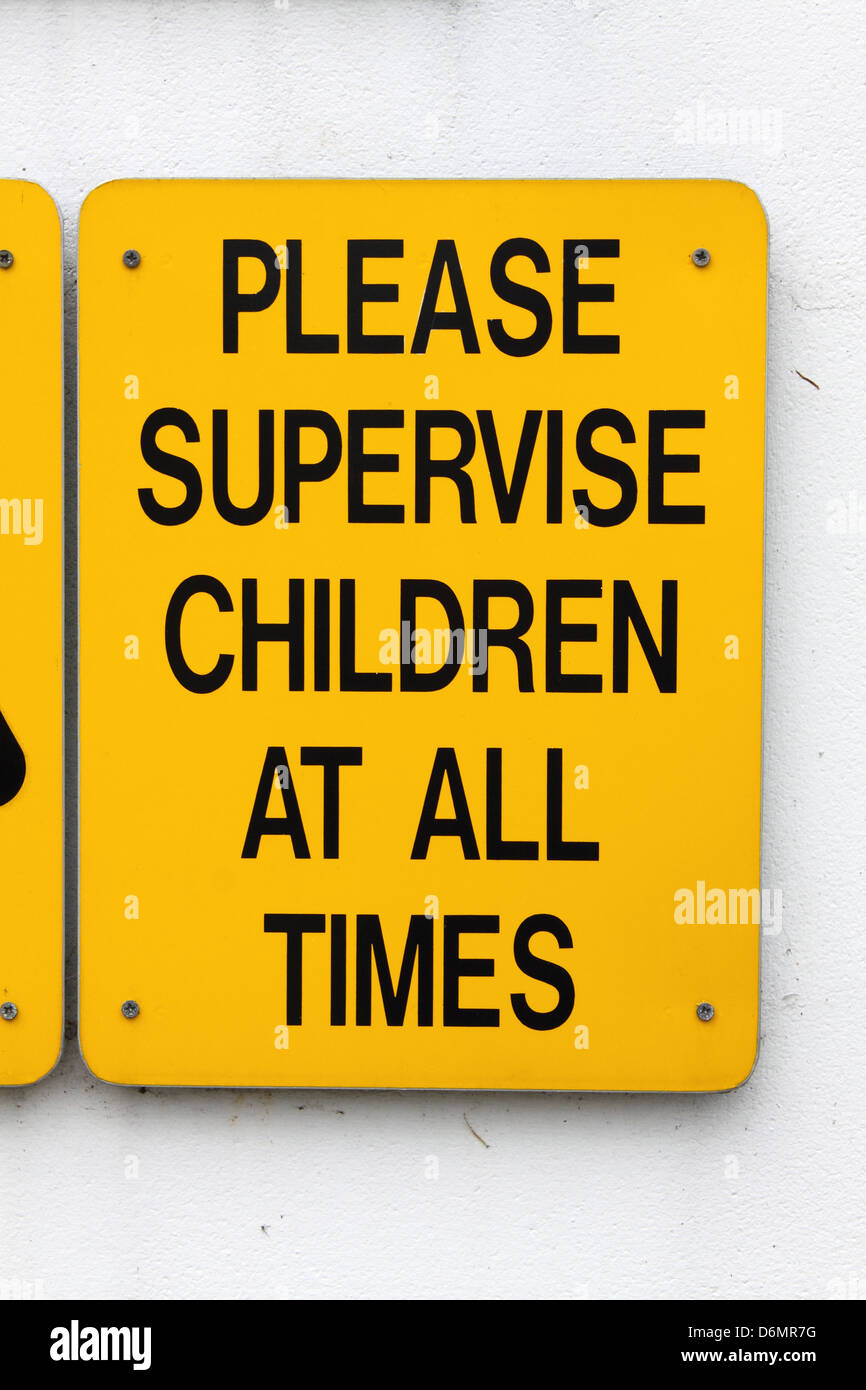 Please Supervise Children at all times' sign Stock Photo