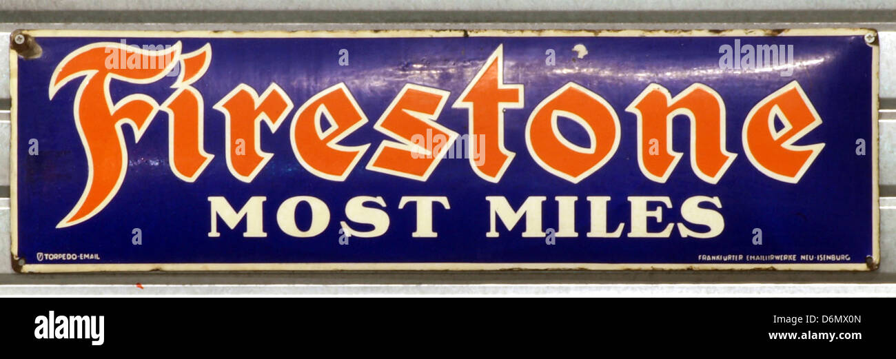 Firestone most miles enamel advert sign at the den hartog ford museum pic-119. Stock Photo