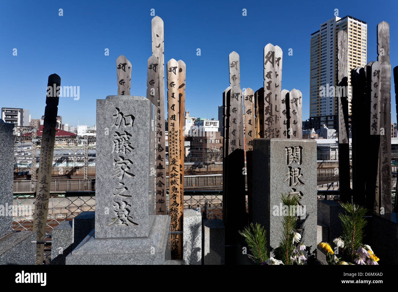 Toba wooden tablets and graves headstones in Yanaka cemetery, Nippori, Tokyo, Japan. Stock Photo