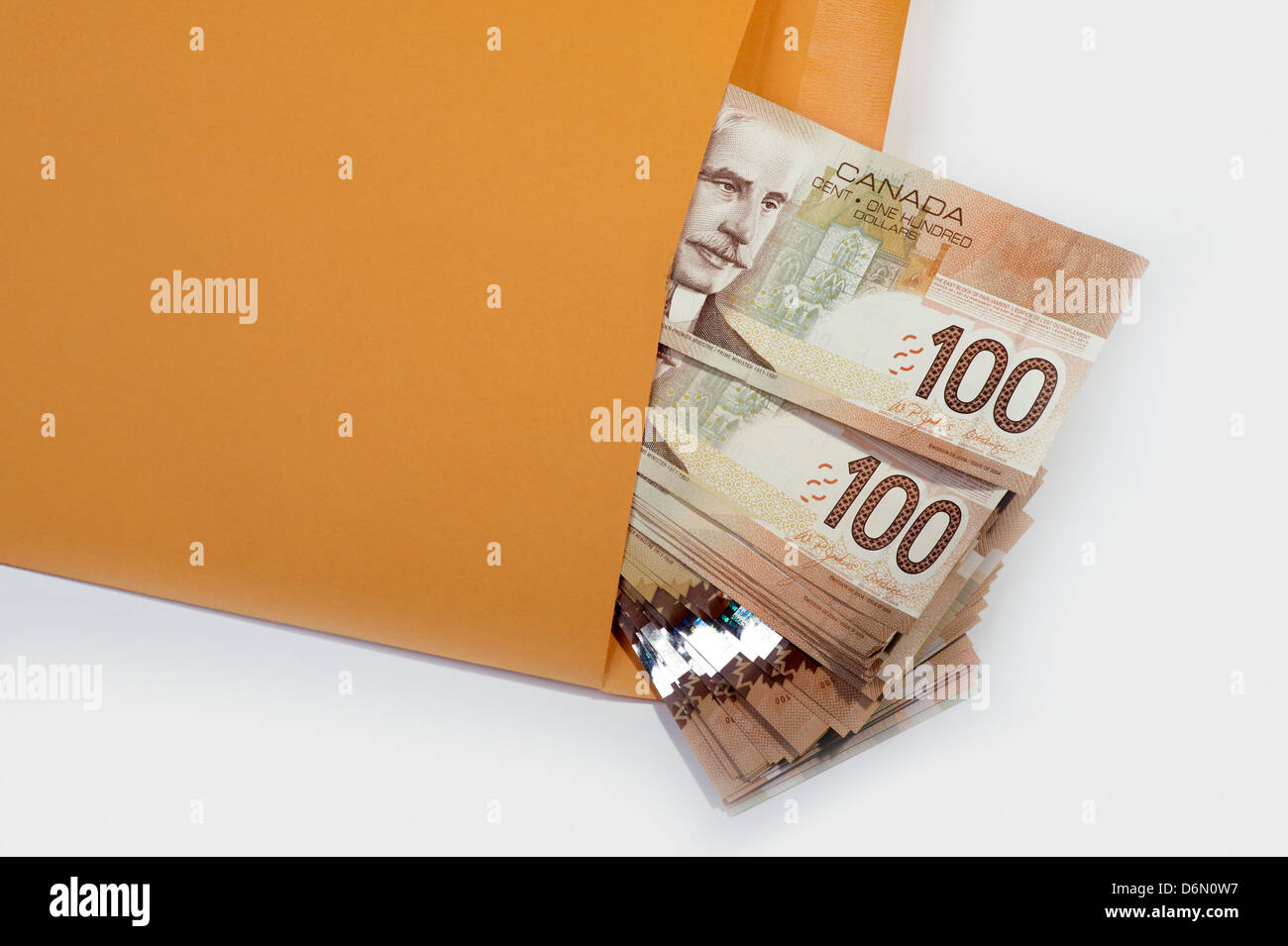 Money Canadian cash in yellow envelope Stock Photo Alamy
