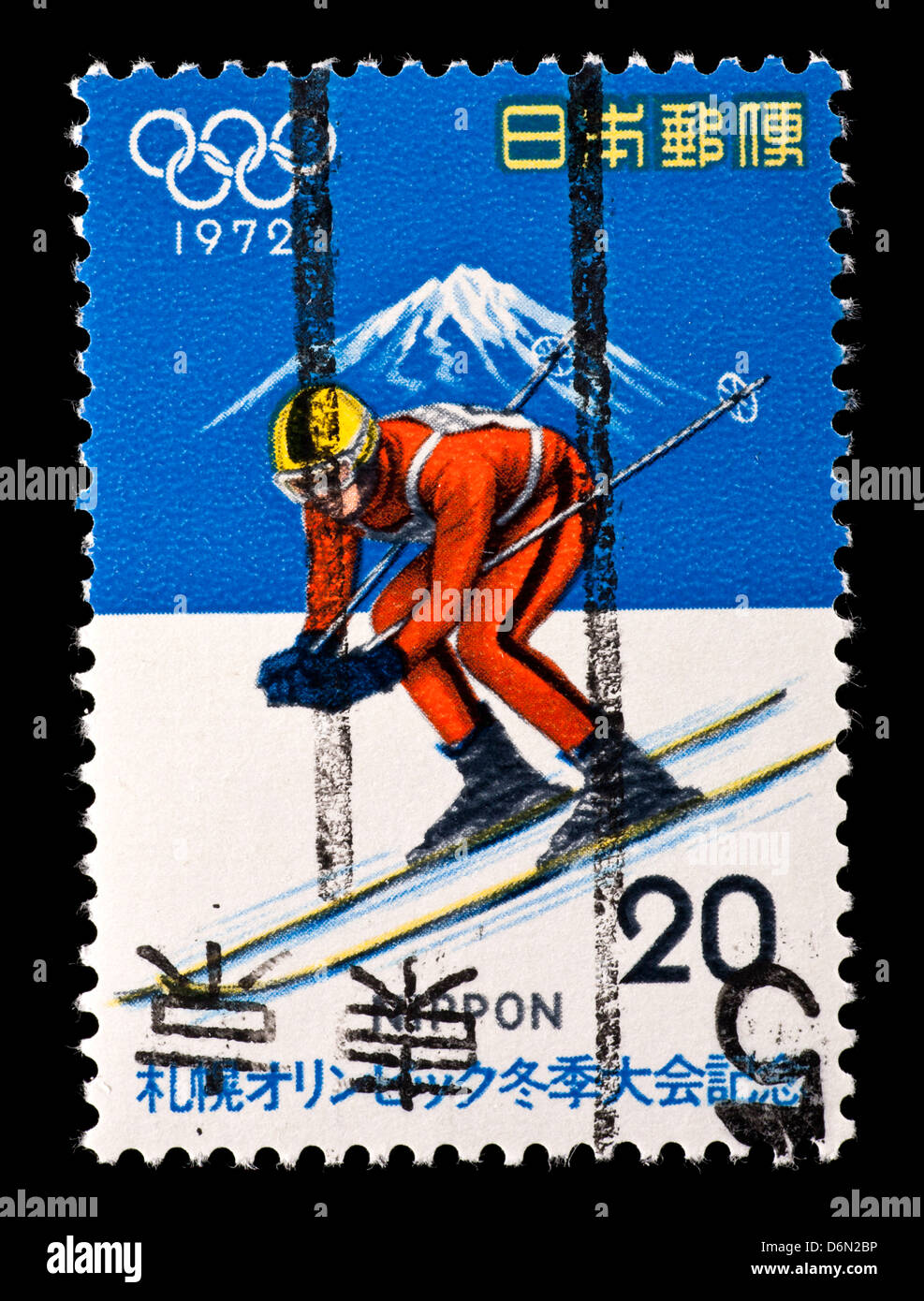 Postage stamp from Japan depicting a downhill skier and Mt. Fuji Stock