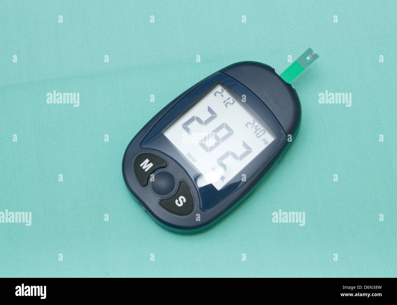 Glucometer use for diabetic blood test Stock Photo