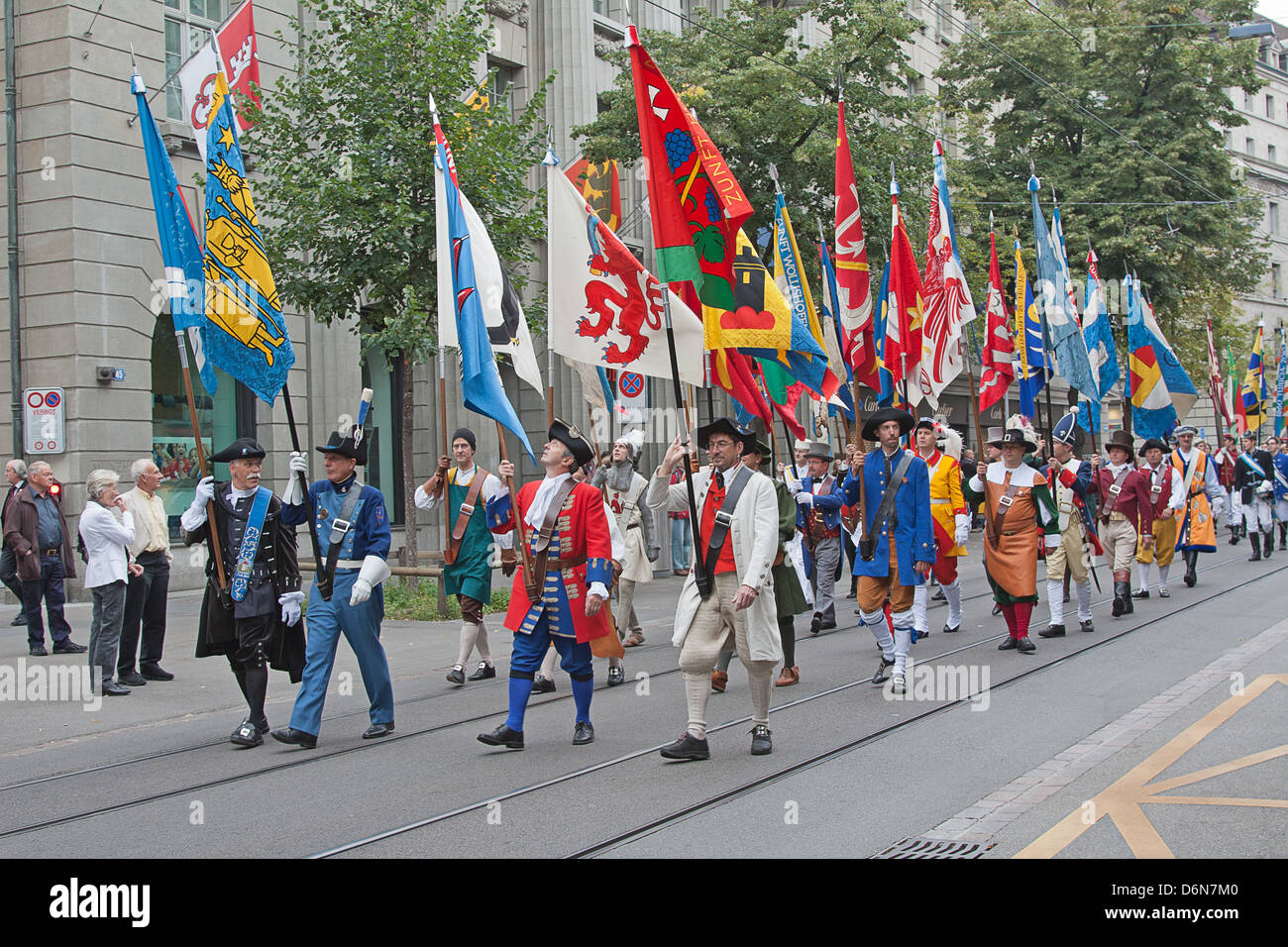 ZURICH - AUGUST 1: Swiss National Day parade on August 1, 2009 in Zurich, Switzerland. Representatives of professional guildes in a historical costumes. Stock Photo