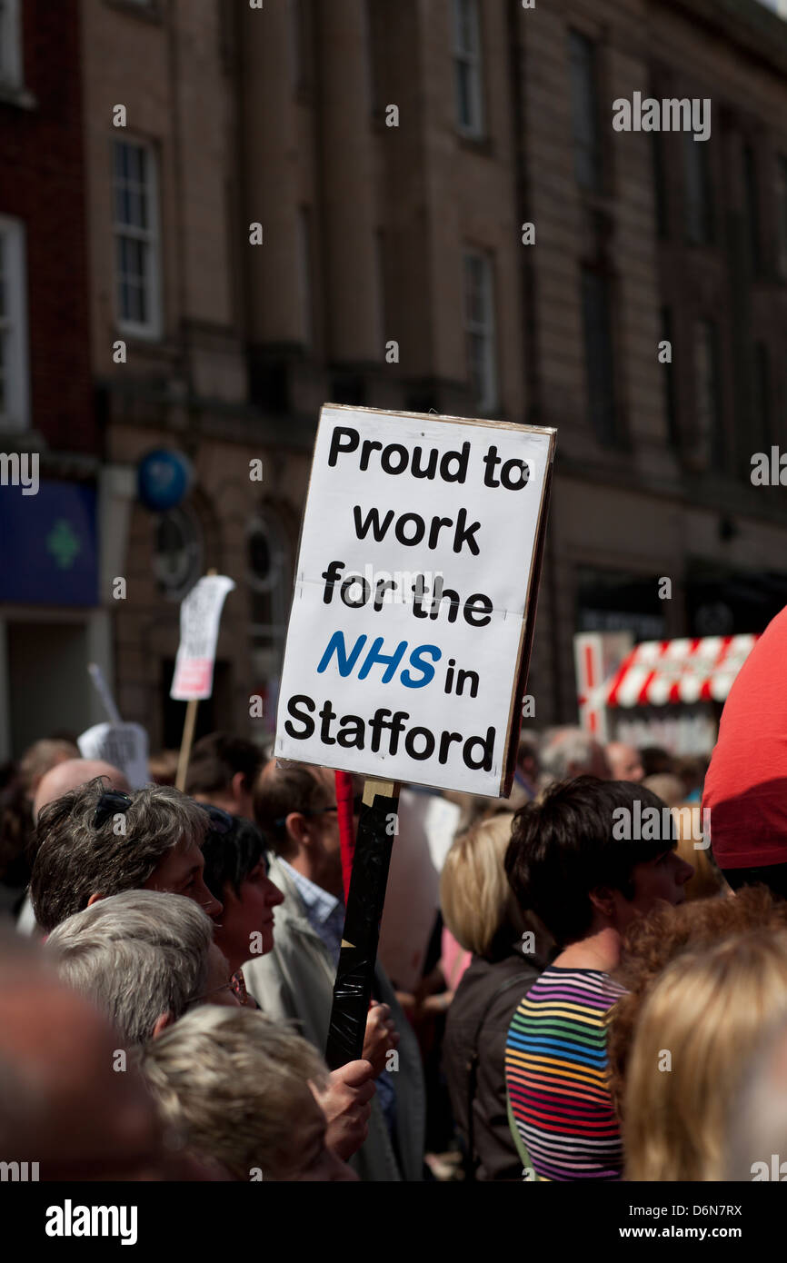 Protesters march through Stafford against cuts to NHS services at Stafford Hospital Stock Photo