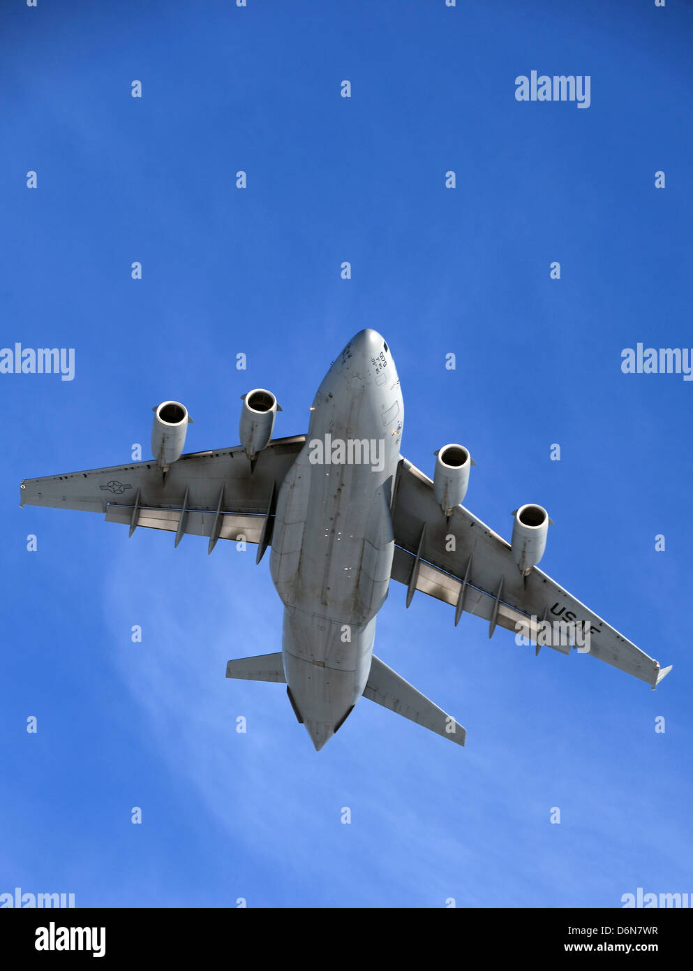 US Air Force C-17 aircraft passes overhead after dropping Army