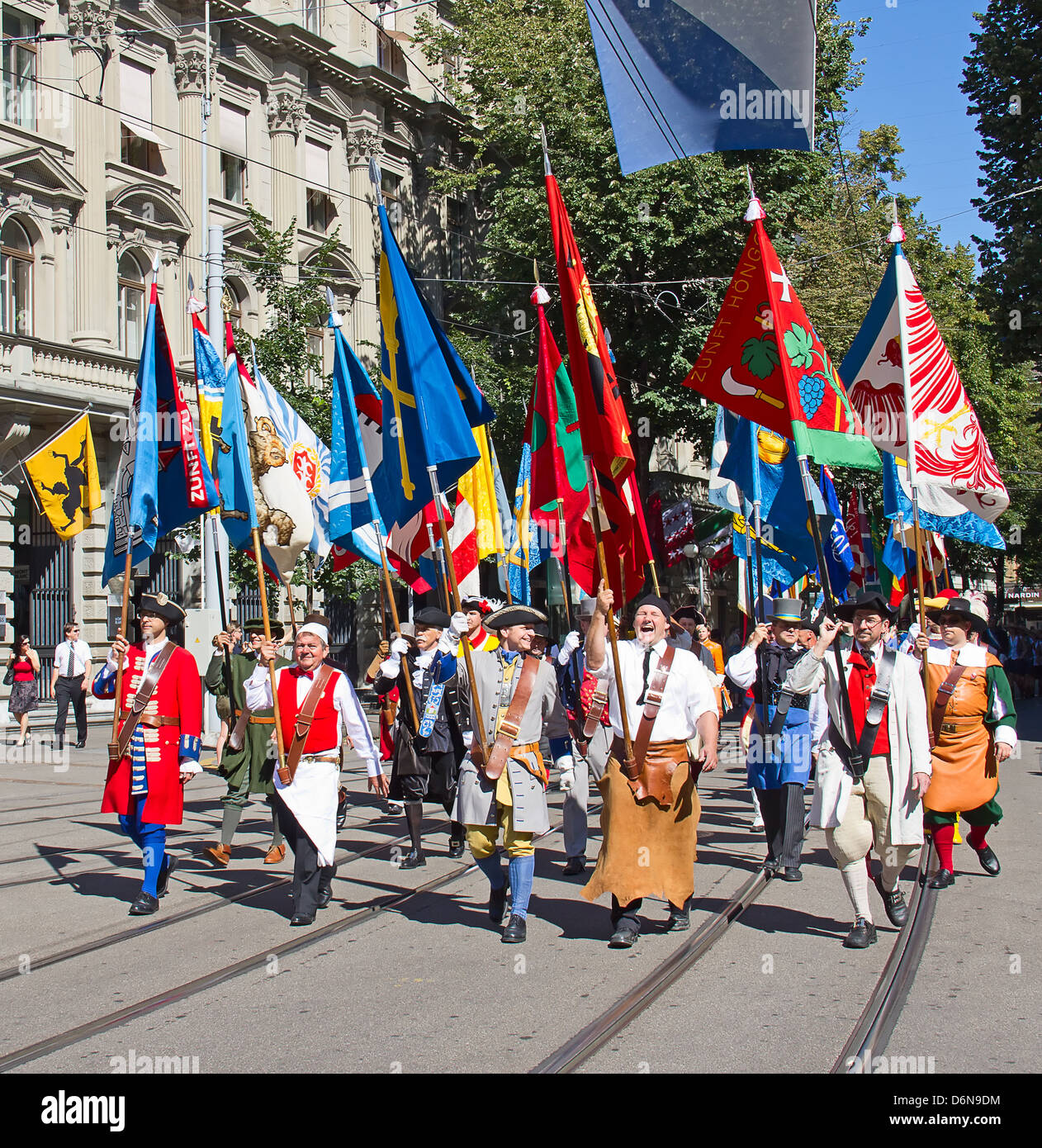 ZURICH - AUGUST 1: Swiss National Day parade on August 1, 2012 in Zurich, Switzerland. Representatives of professional guilds of city Zürich in a historical costumes taking part in parade. Stock Photo