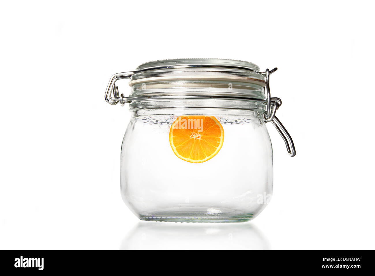 clear tub with fresh orange inside Stock Photo Alamy