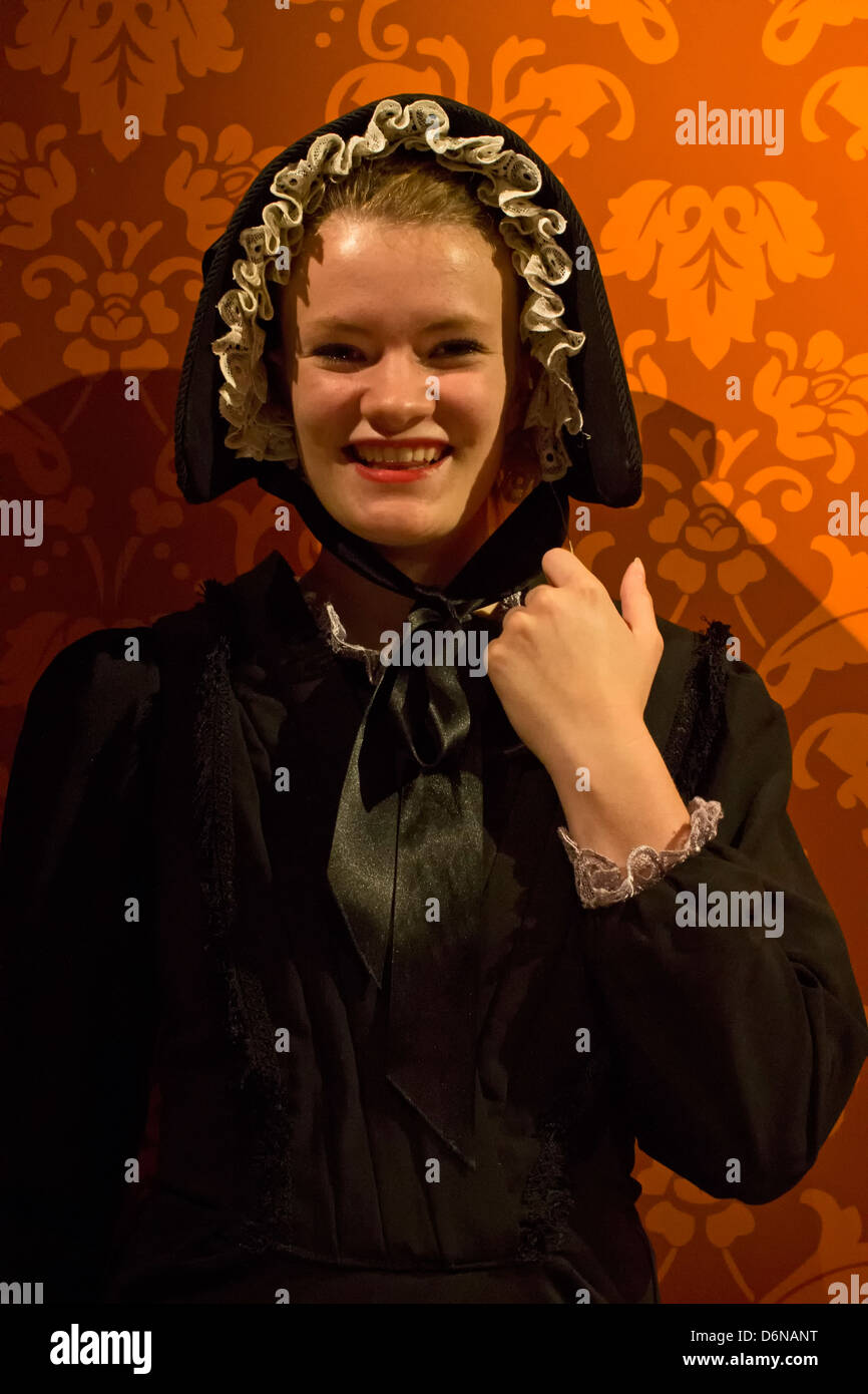 Portrait of a Dutch woman smilling traditionally dressed. Stock Photo
