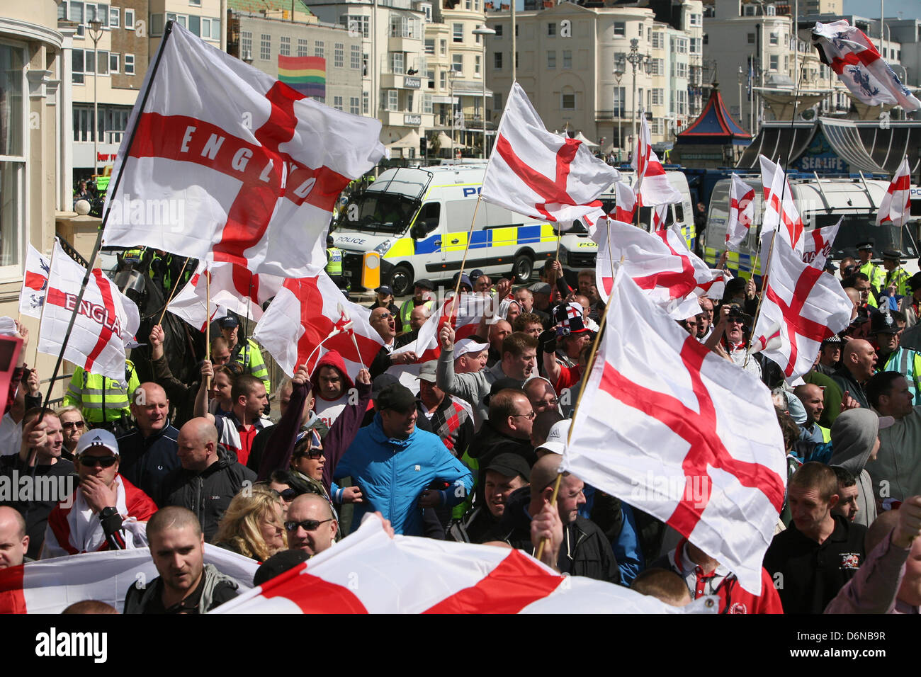 London, UK. 21st April, 2013.  EDL supporters take part in a 'March for England' in Brighton opposed by Anti-facist protesters along beachfront  Credit:  Mario Mitsis / Alamy Live News Stock Photo
