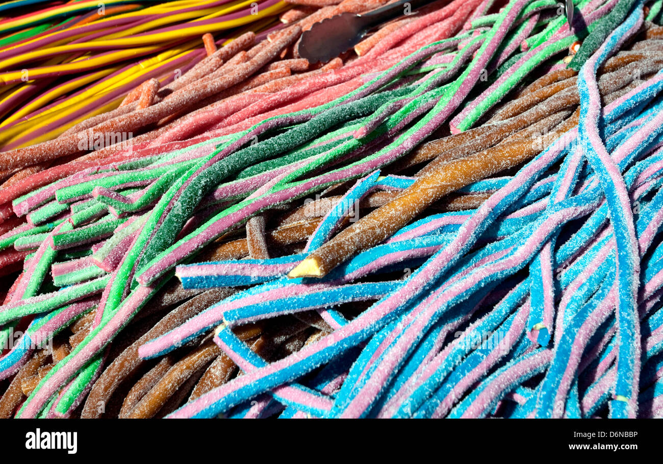 Strips of coloured liquorice on sale in Partridges food market, Chelsea